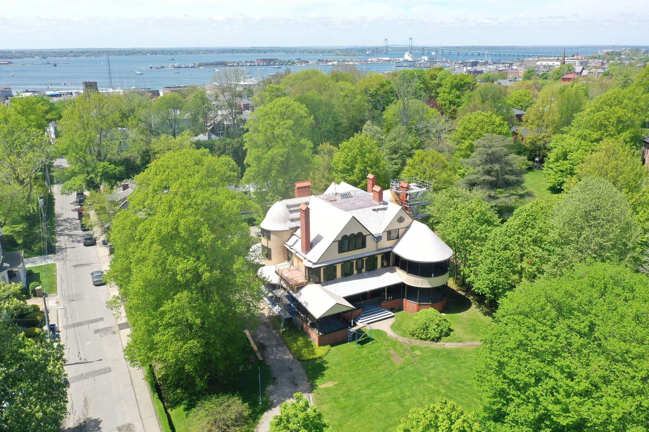 Historic preservation/restoration at the Isaac Bell house, featuring wood siding and wood roofing in Newport, RI, by Slate and Copper Services