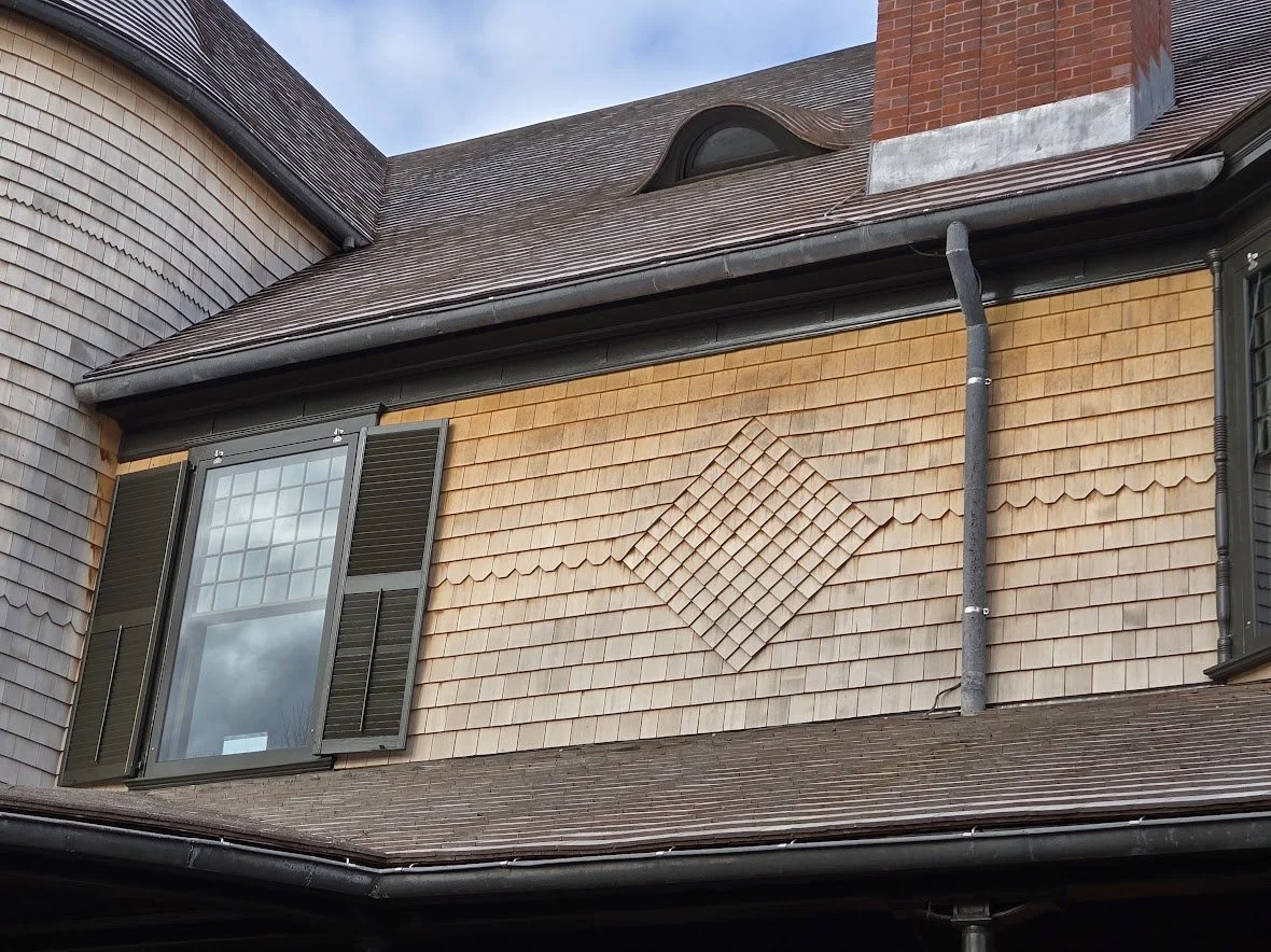 Historic preservation/restoration at the Isaac Bell house, featuring wood siding and wood roofing in Newport, RI, by Slate and Copper Services