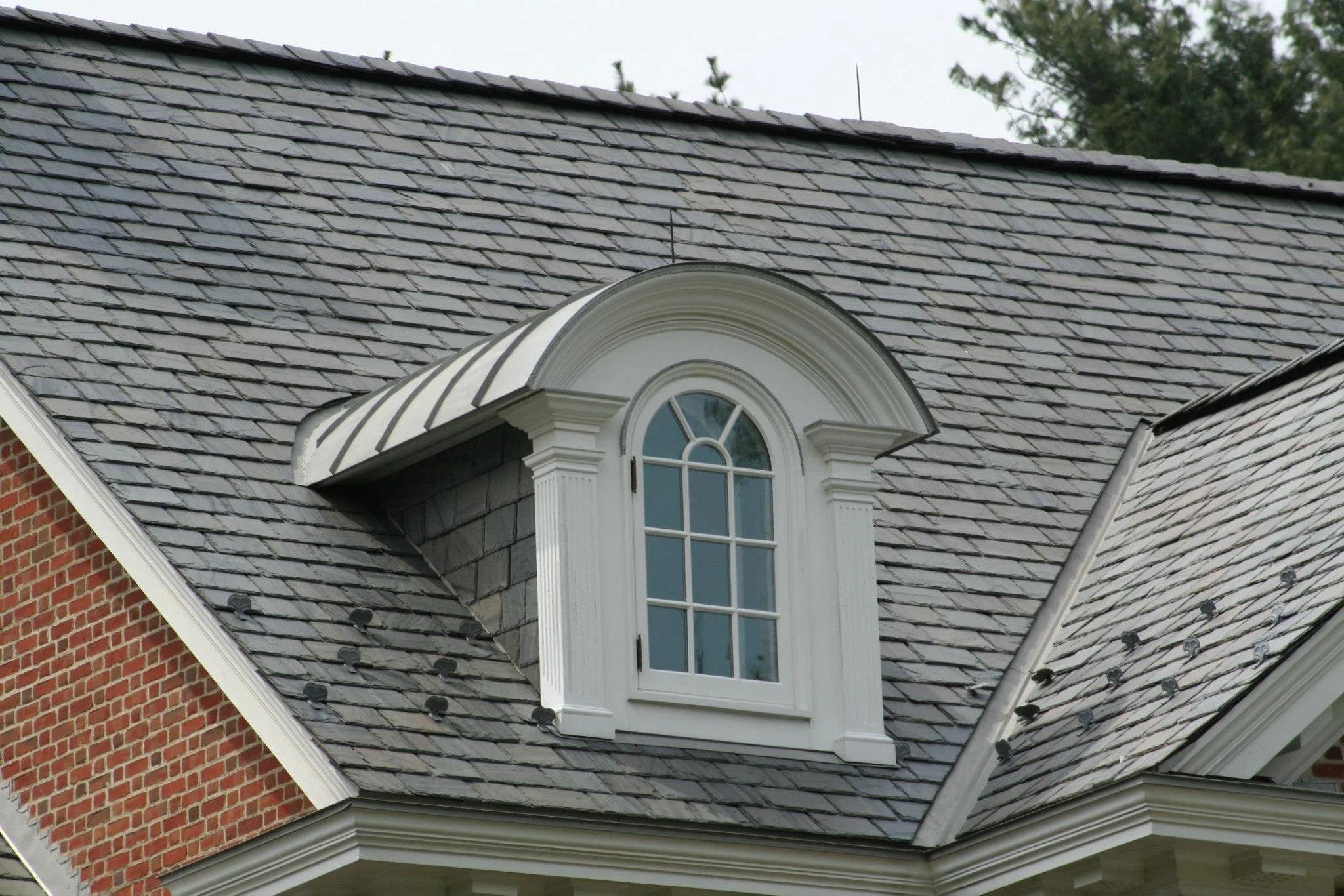Slate roofing and copper covered dormer on home by Slate & Copper Services, Portsmouth, RI, and Easton, Connecticut