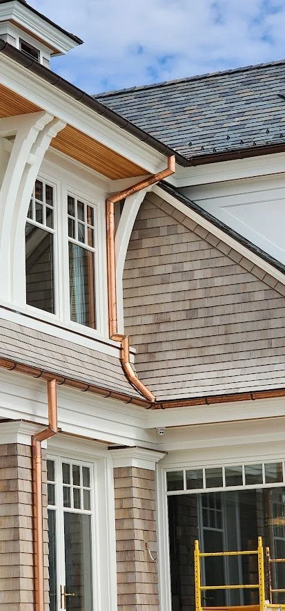 Slate roofing, wood siding, and copper guttering by Slate and Copper Services in Portsmouth, Rhode Island and Easton, Connecticut, serving Fairfield County, Providence, coastal RI, and South Coast, MA.