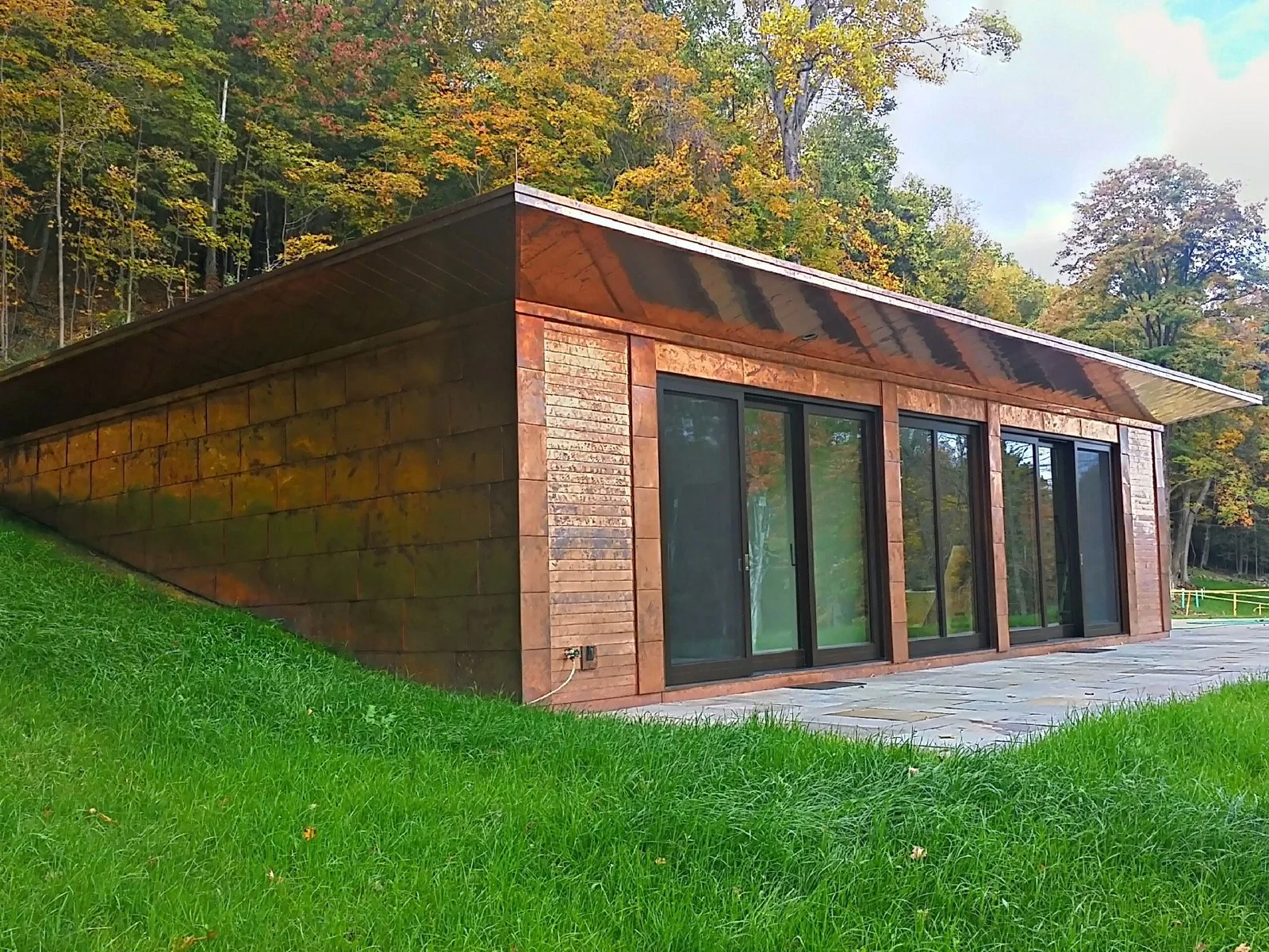 Metal Wall Cladding and copper roof on a home by Slate & Copper Services, Portsmouth, Rhode Island, and Easton, Connecticut