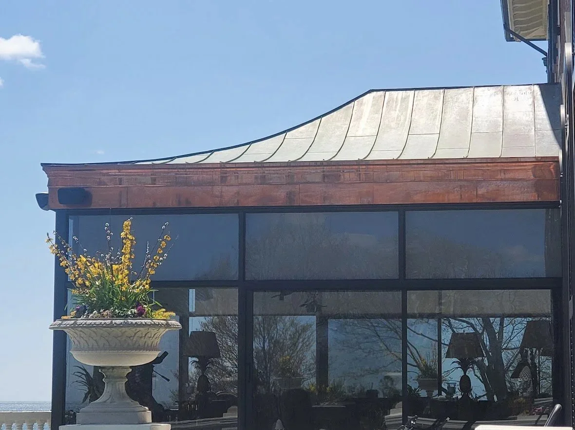 Metal roofing, copper wall cladding and guttering by Slate and Copper Services in Portsmouth, Rhode Island and Easton, Connecticut, serving Fairfield County, Providence, coastal RI, and South Coast, MA.