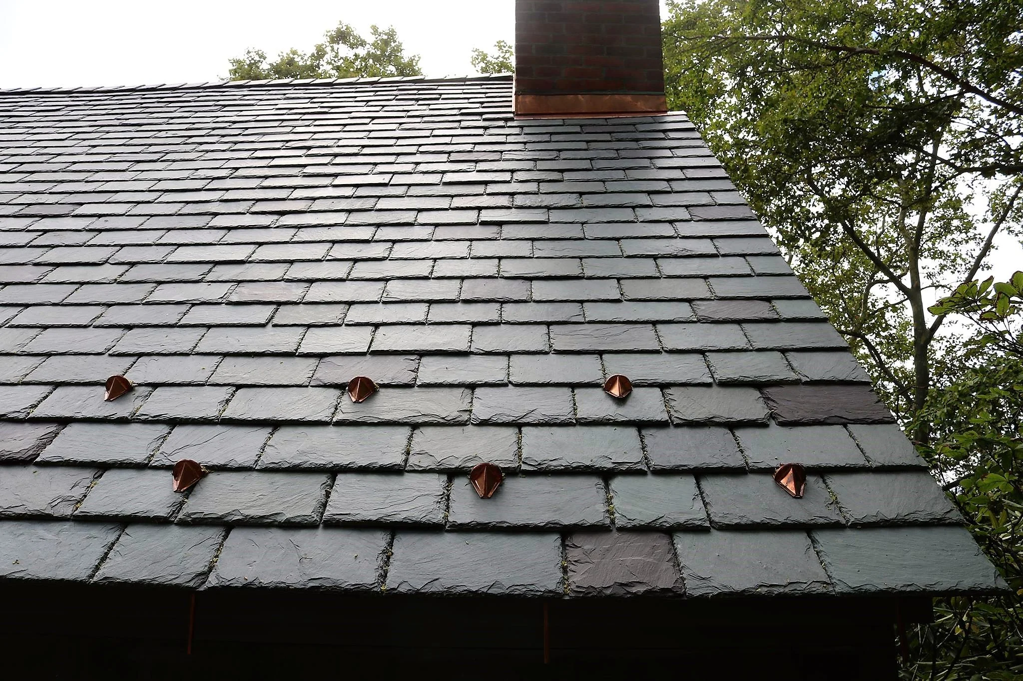 Slate roofing and copper gutters on home in Newport, Rhode Island by Slate & Copper Services, Portsmouth, RI, and Easton, Connecticut