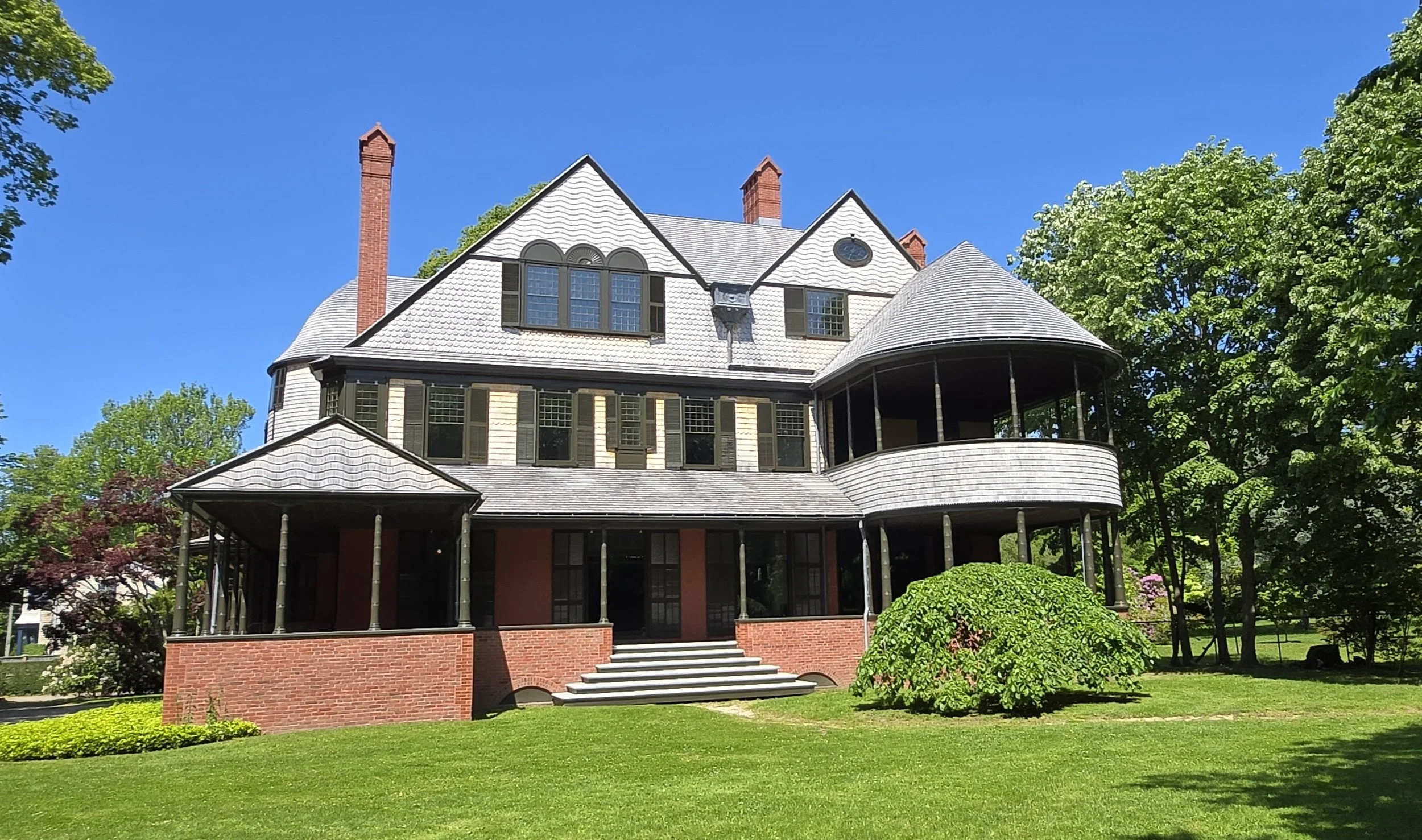 Historic preservation/restoration at the Isaac Bell house, featuring wood siding and wood roofing in Newport, RI, by Slate and Copper Services