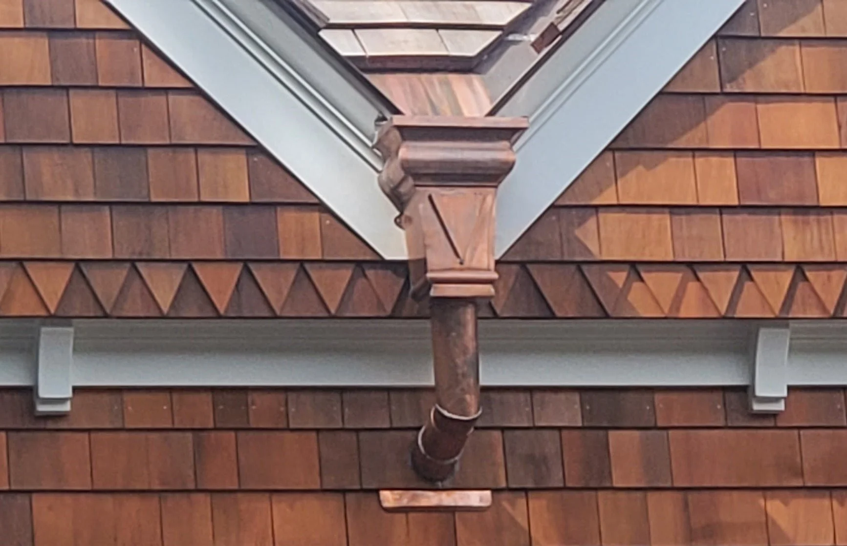 Wood siding and roofing, copper guttering by Slate and Copper Services in Portsmouth, Rhode Island and Easton, Connecticut, serving Fairfield County, Providence, coastal RI, and South Coast, MA.