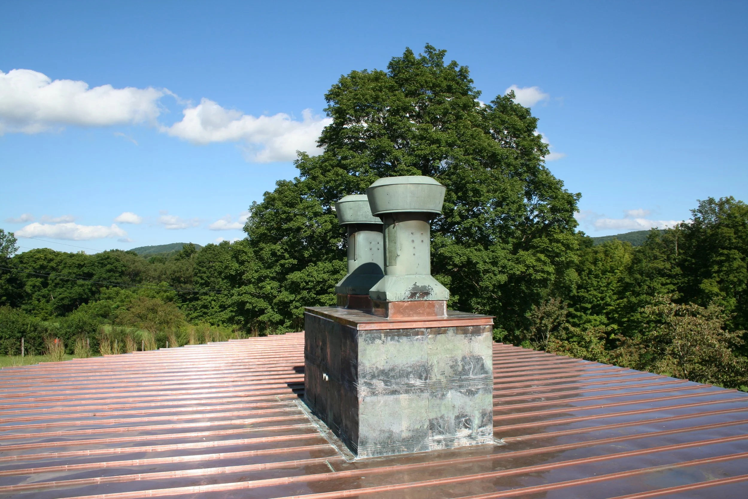 Metal roofing, copper guttering by Slate and Copper Services in Portsmouth, Rhode Island and Easton, Connecticut, serving Fairfield County, Providence, coastal RI, and South Coast, MA.