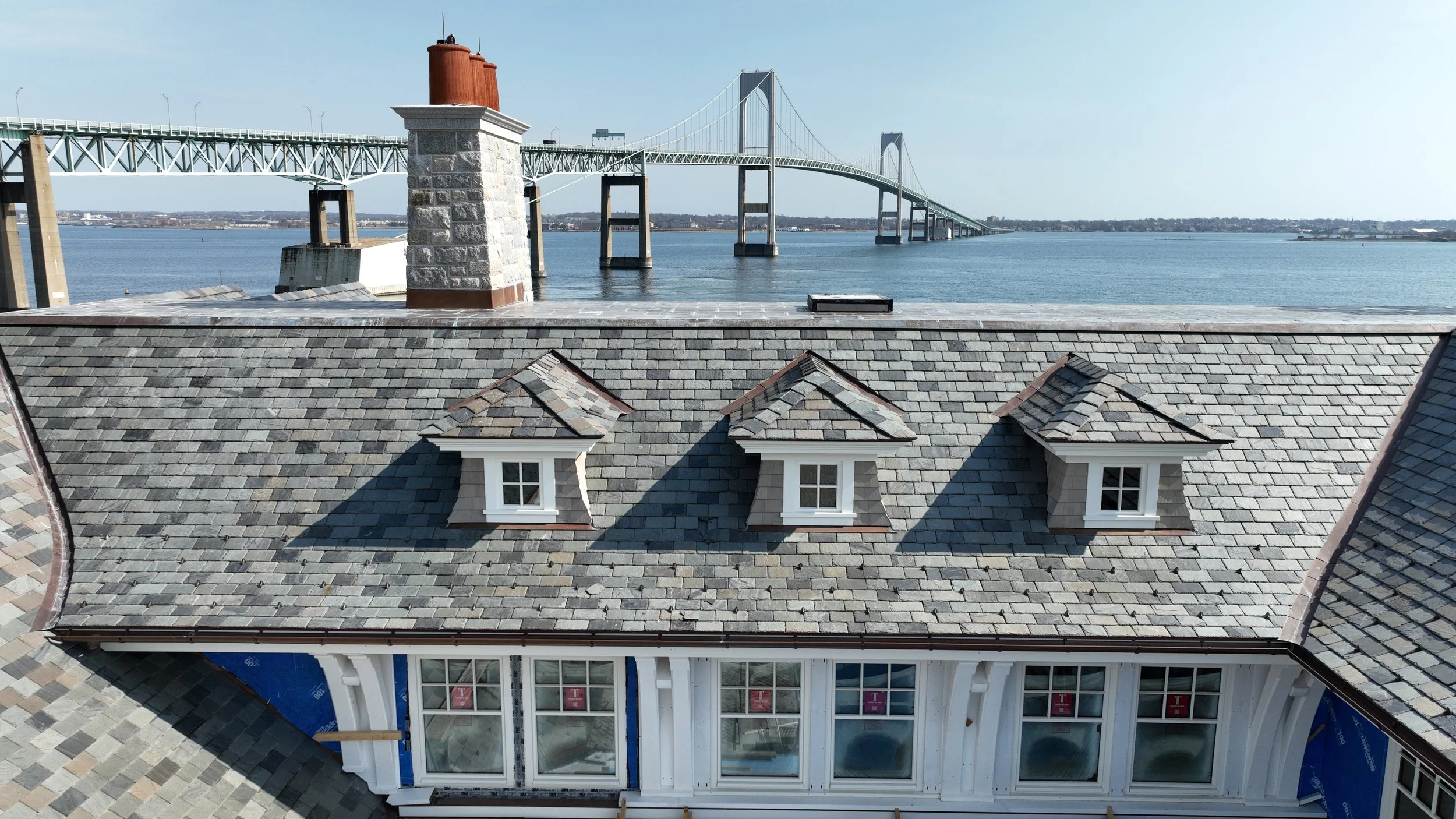 Slate roofing and copper gutters on home in Jamestown, Rhode Island by Slate & Copper Services, Portsmouth, RI, and Easton, Connecticut