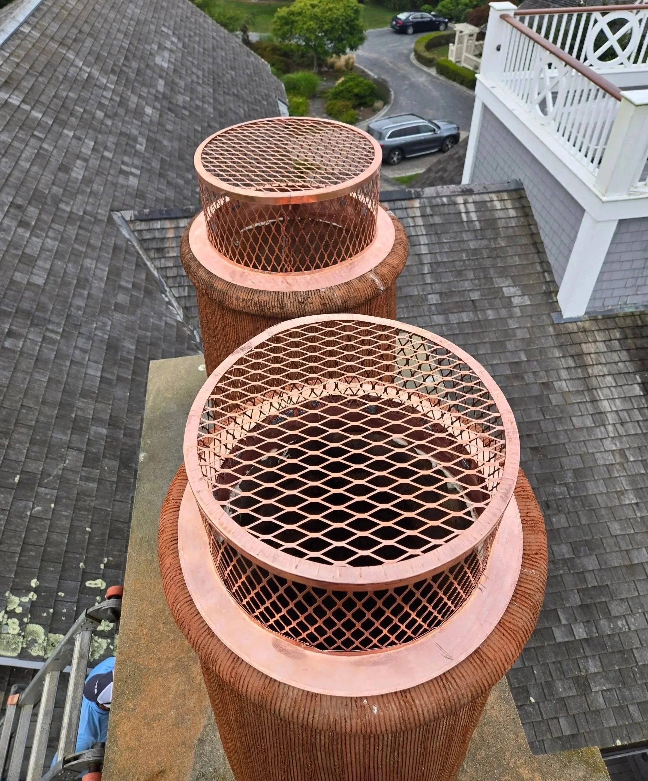 Wood roofing, copper chimney cap, flashing, and guttering by Slate and Copper Services in Portsmouth, Rhode Island and Easton, Connecticut, serving Fairfield County, Providence, coastal RI, and South Coast, MA.