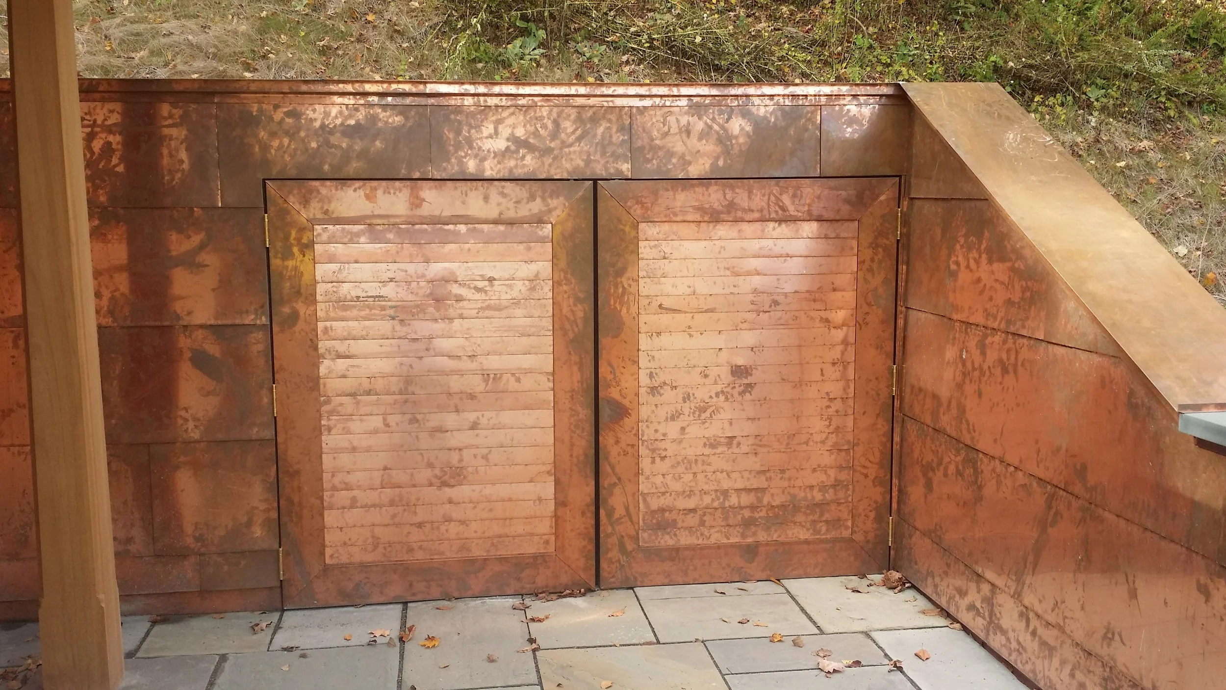 Metal Wall Cladding on a door by Slate & Copper Services, Portsmouth, Rhode Island, and Easton, Connecticut