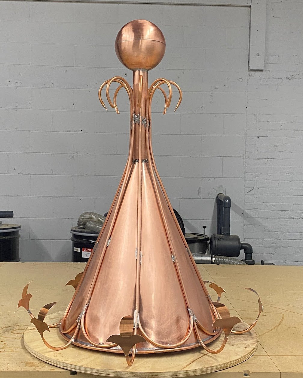 Copper finial by Slate and Copper Services in Portsmouth, Rhode Island and Easton, Connecticut, serving Fairfield County, Providence, coastal RI, and South Coast, MA.