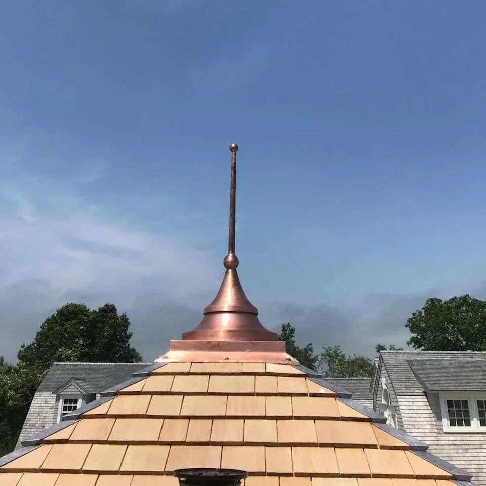 Wood roofing and copper spire or finial on historic home in Newport, Rhode Island by Slate & Copper Services, Portsmouth, RI, and Easton, Connecticut