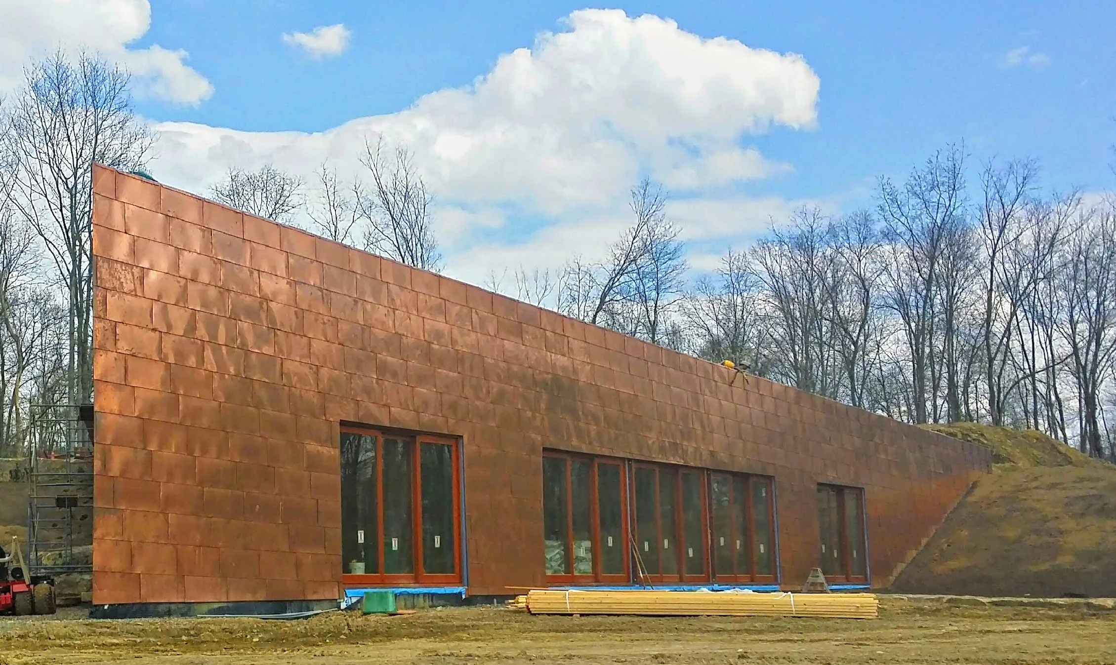Metal Wall Cladding on a home by Slate & Copper Services, Portsmouth, Rhode Island, and Easton, Connecticut