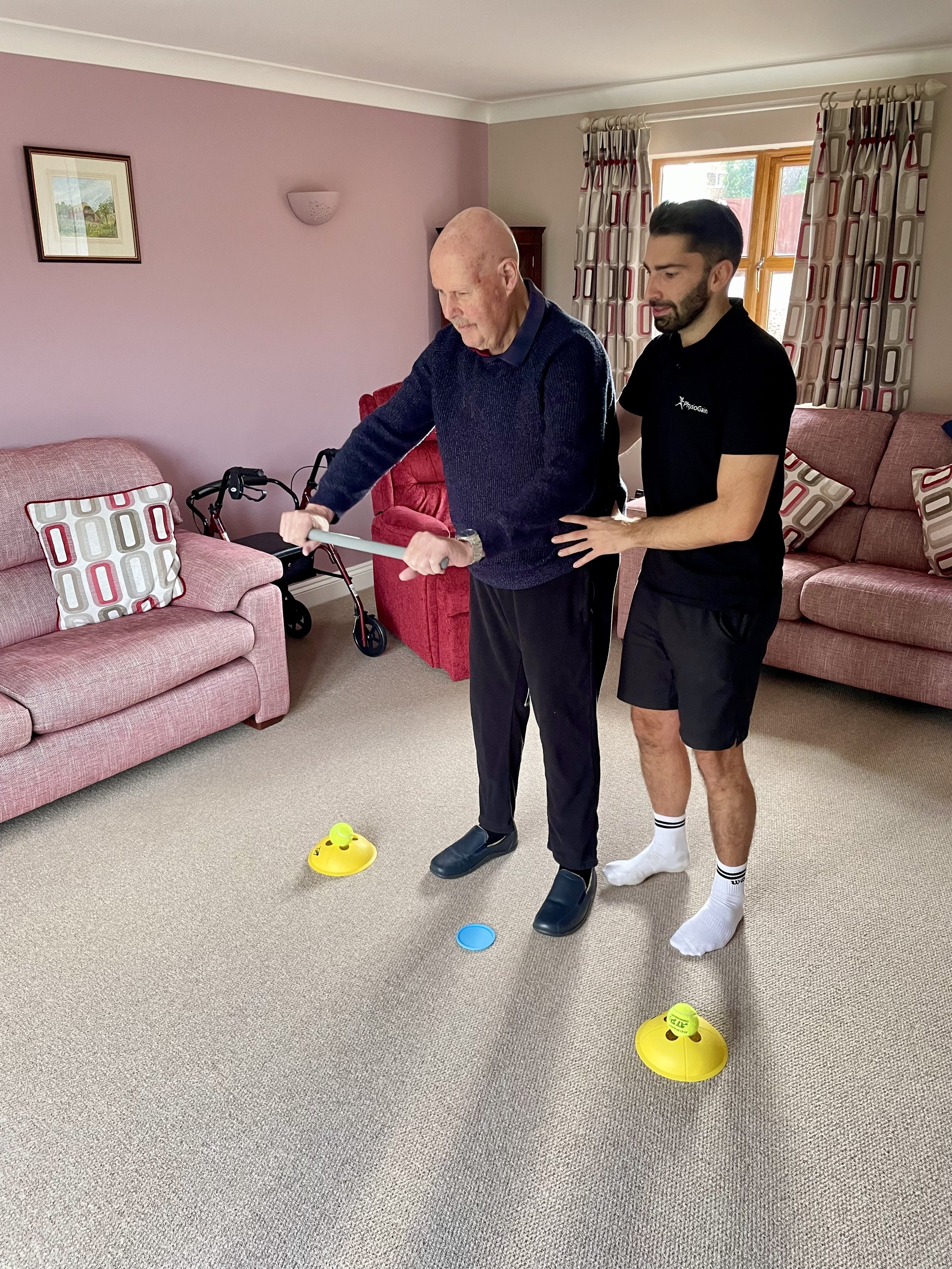 Physio helping with balance exercises