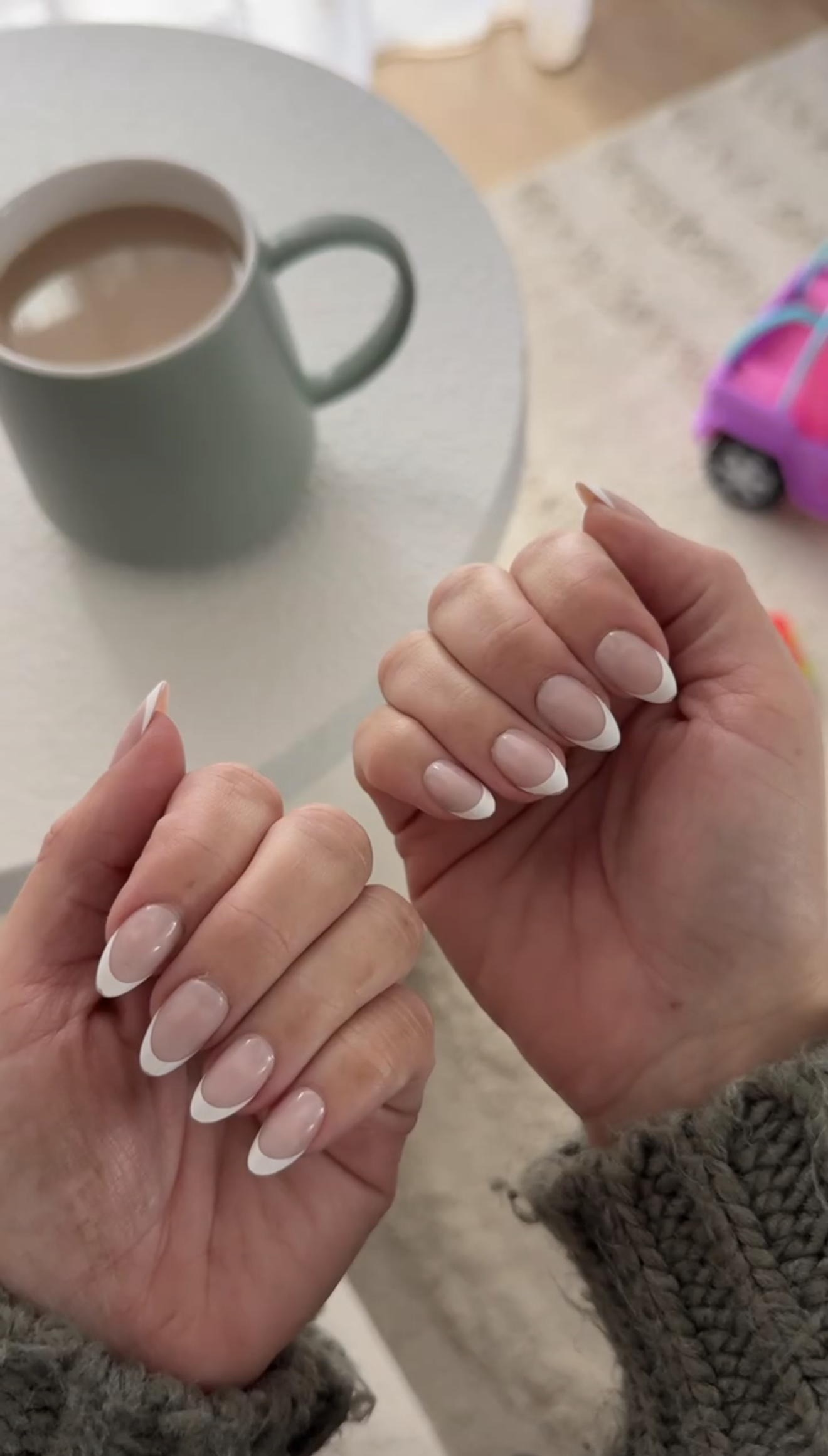 Samantha Elle, founder of ALLESA, showcasing her french tip nails from Candy Claws in UGC campaign
