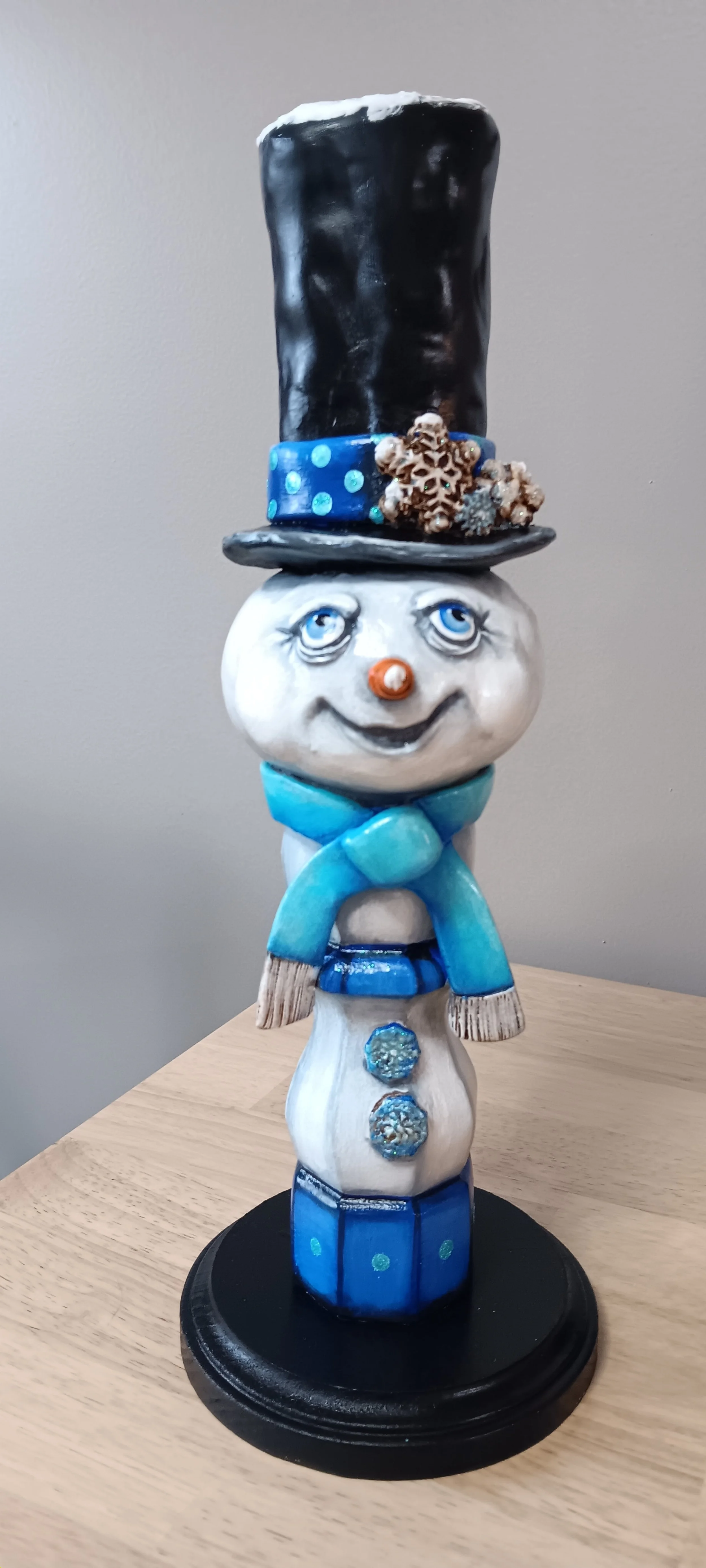 Blue Snowman Gourd on candlestick
