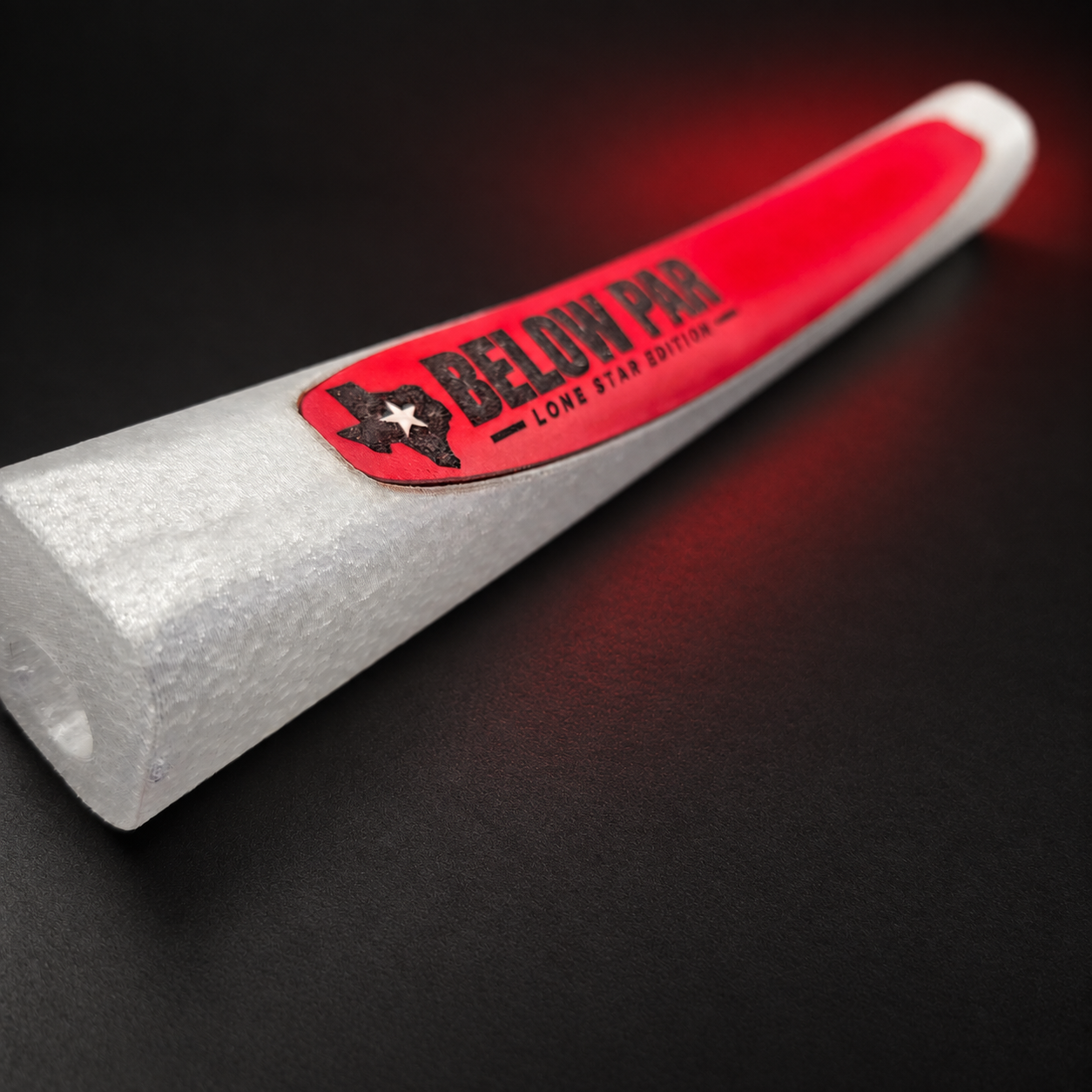 The First Cut red leather grip