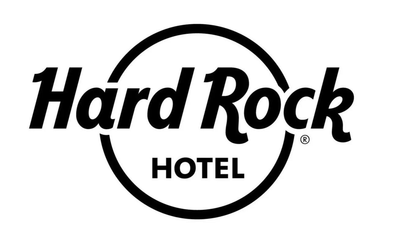 Black and white logo for Hard Rock Hotel with the words 'Hard Rock' in stylized font inside a circle and 'HOTEL' underneath.