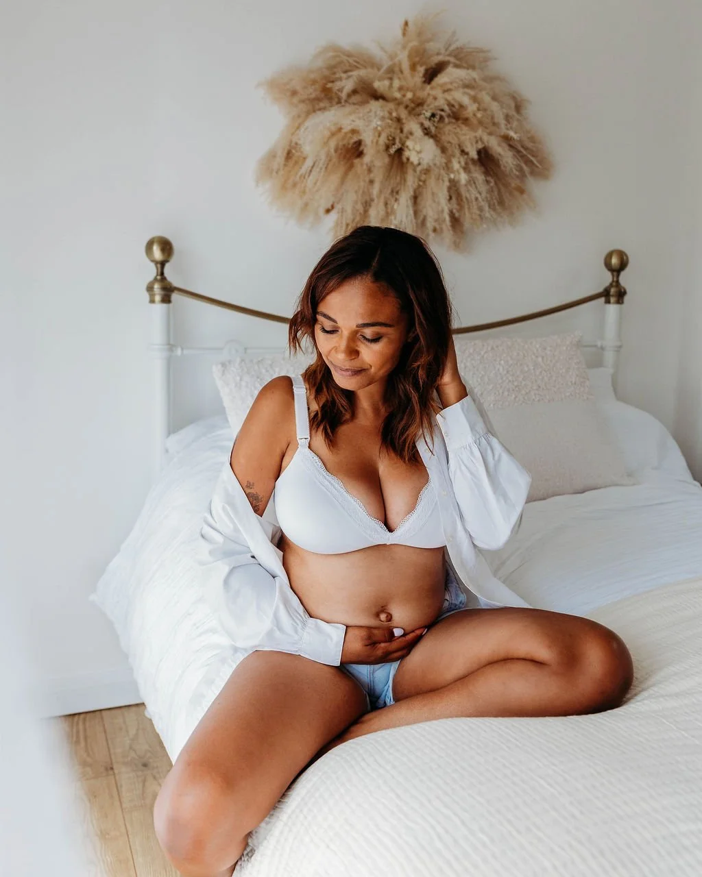 Gentle postnatal support for new parents including feeding help, emotional check-ins, and practical care during the fourth trimester.