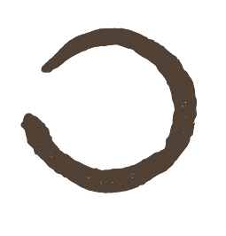 A partially open, circular, brownish-black ring on a black background.