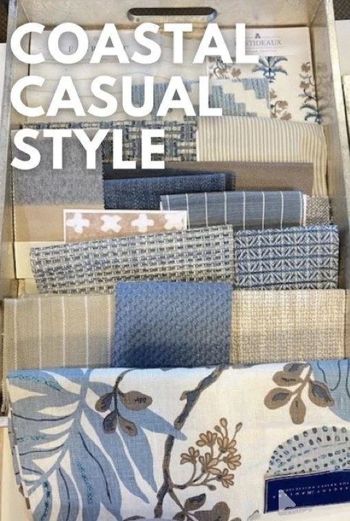 Display of coastal casual style fabrics with various patterns and textures, arranged in rows in a furniture store.