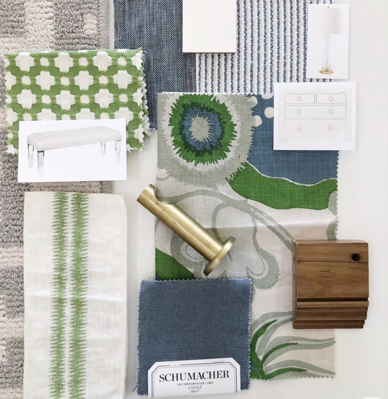 Collection of interior design samples including fabric swatches, rugs, a small wooden table, a brass candle holder, and images of furniture and lamps.