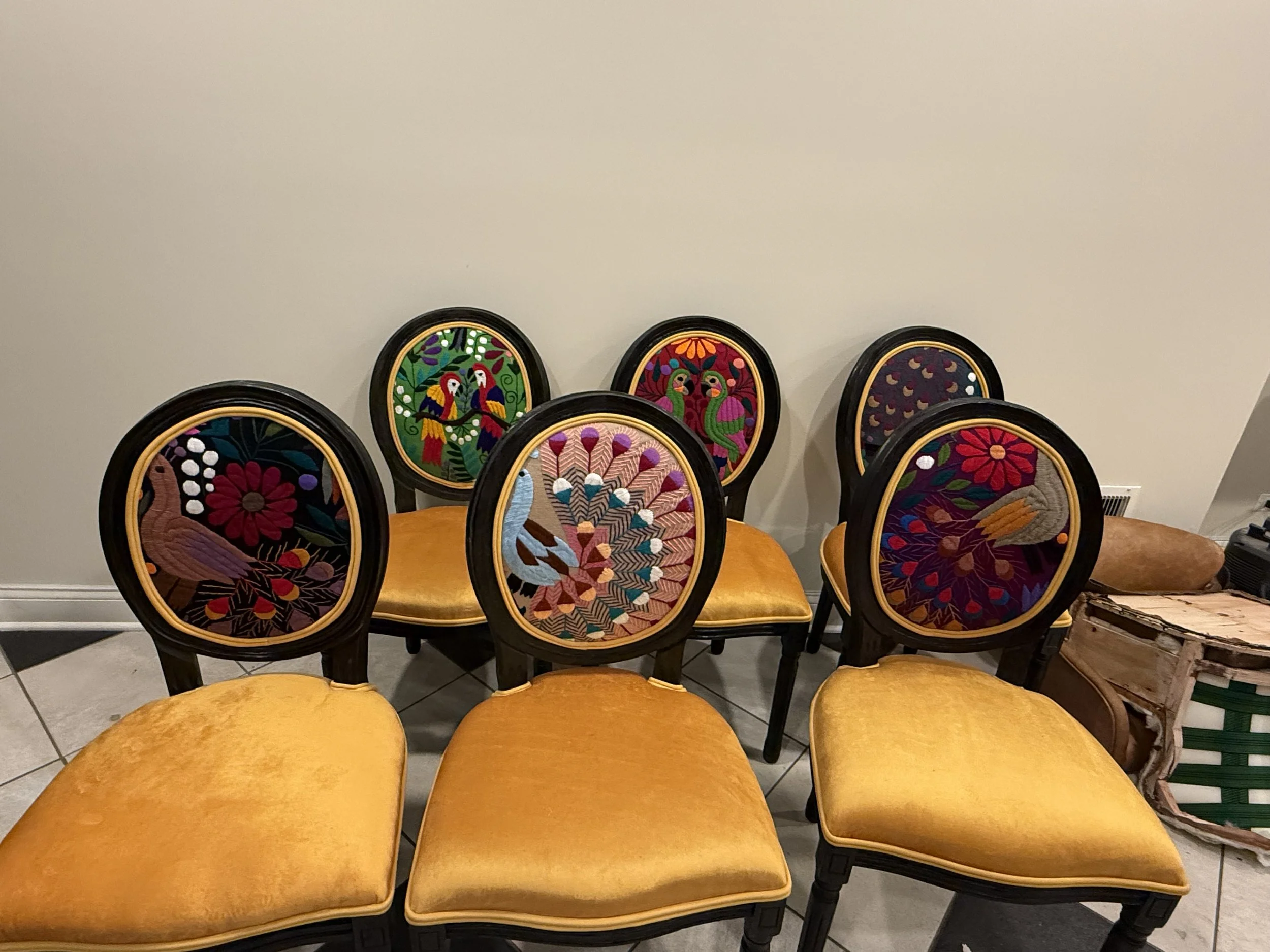 Black frames, gold seats, assorted textiles