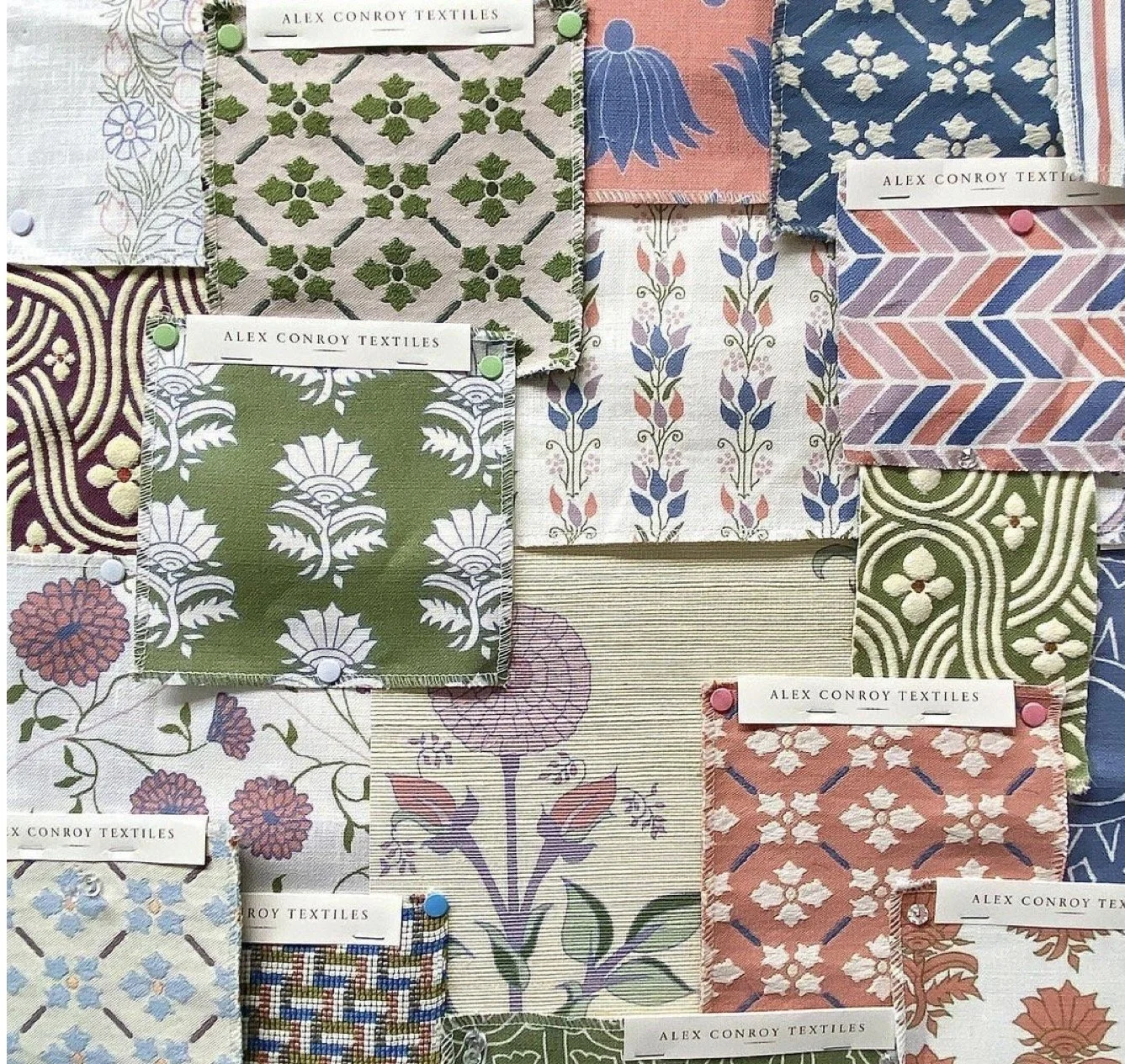 Sample of fabric swatches with various floral, geometric, and abstract patterns in different colors and textures. Each swatch has a label saying 'Alex Conroy Textiles'.