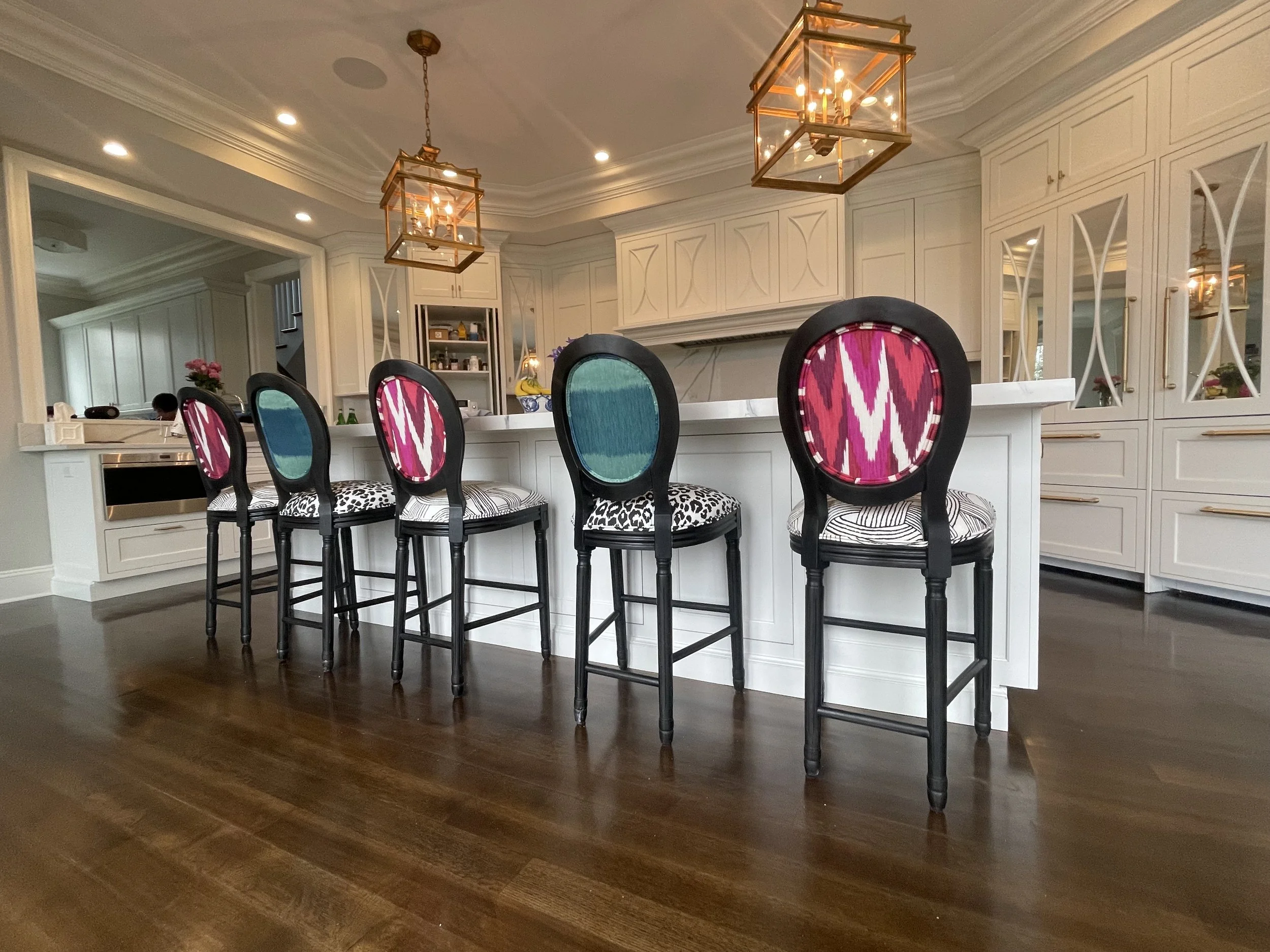 Designer white kitchen with a splash of color