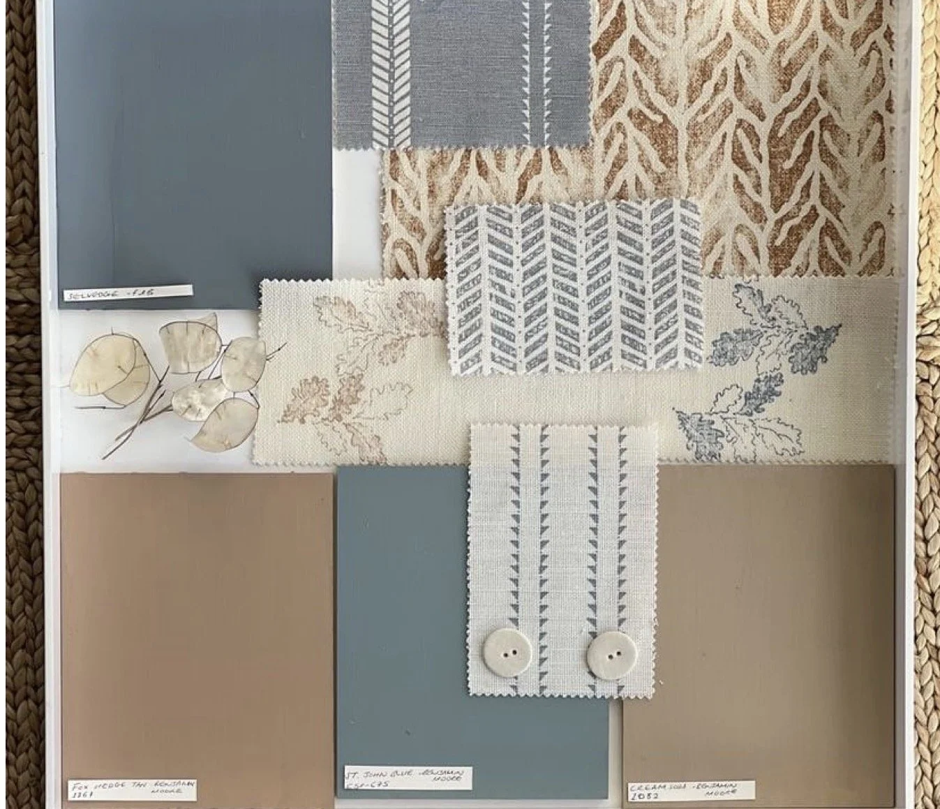 Interior design fabric and color swatch samples arranged in a pattern.