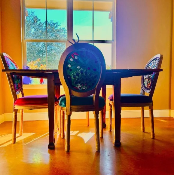 Light reflecting on Mexican textile Chairs