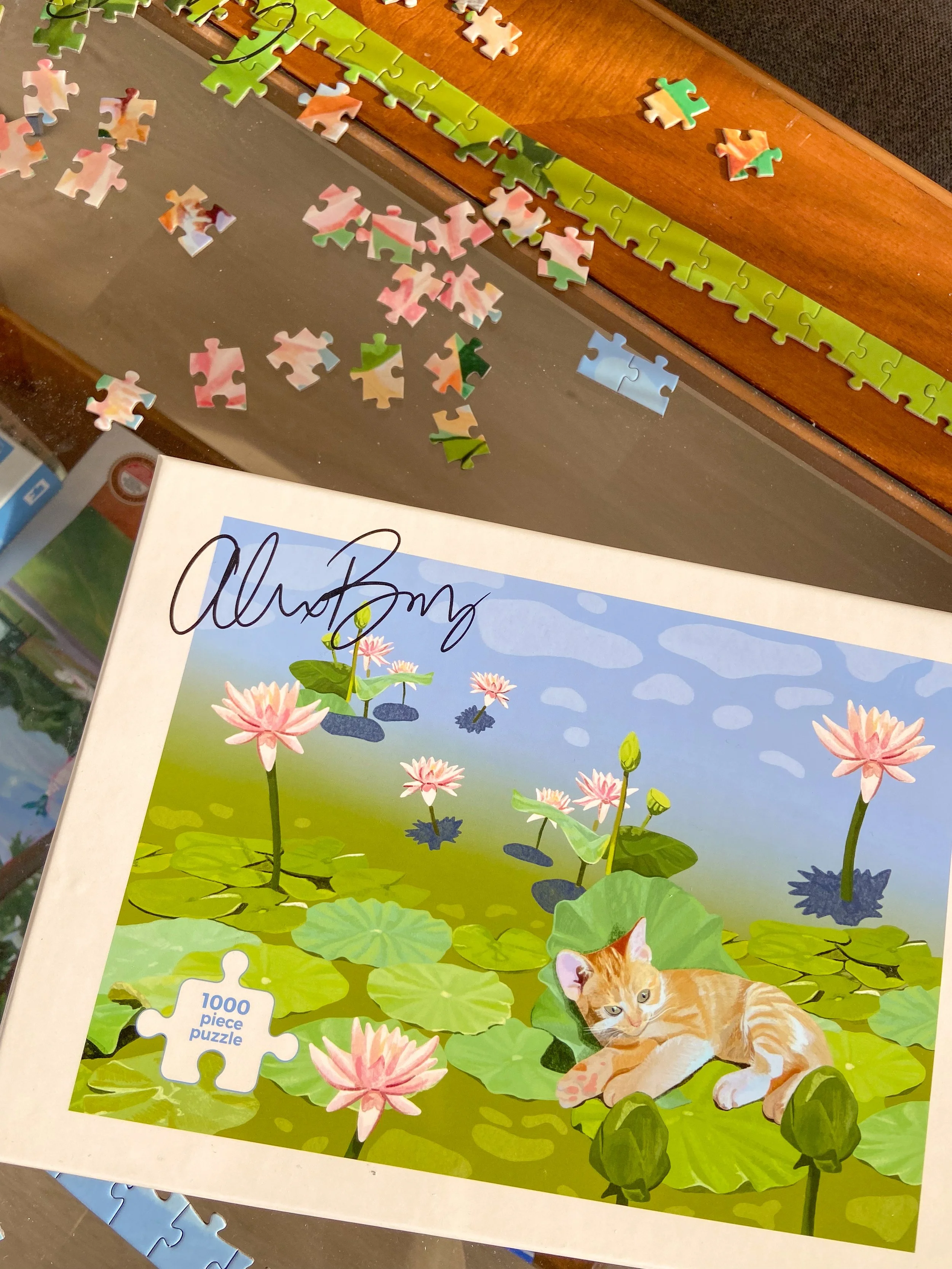 A cute cat puzzle. Original artwork by Alex Bray. Jigsaw puzzle pieces