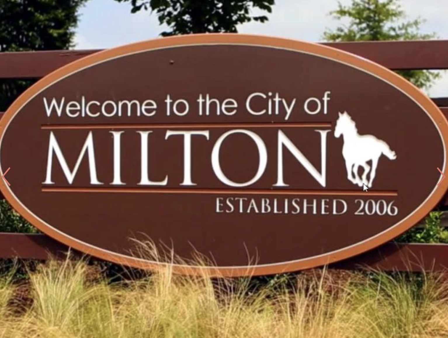 Welcome sign taken from the road Welcome to the City of Milton G