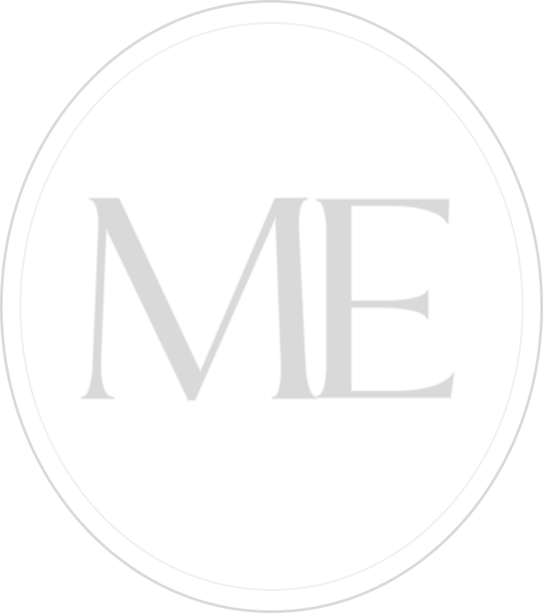 Black background with a gray circle and the word "ME" in large gray letters in the center.