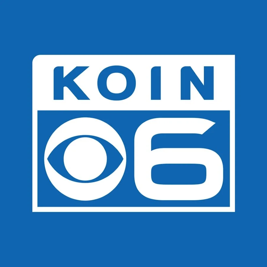 The logo of of KOIN 6, an American television station, with white text and graphics on a blue background.