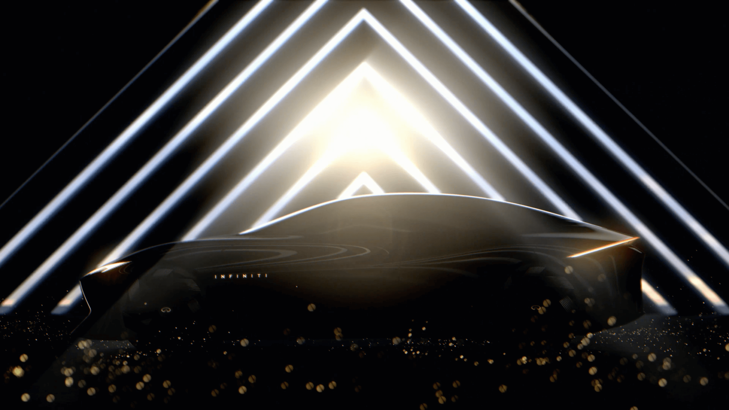 A futuristic, sleek black car with illuminated geometric angles and lines in the background, with the word 'INFINITI' visible on the front of the vehicle.