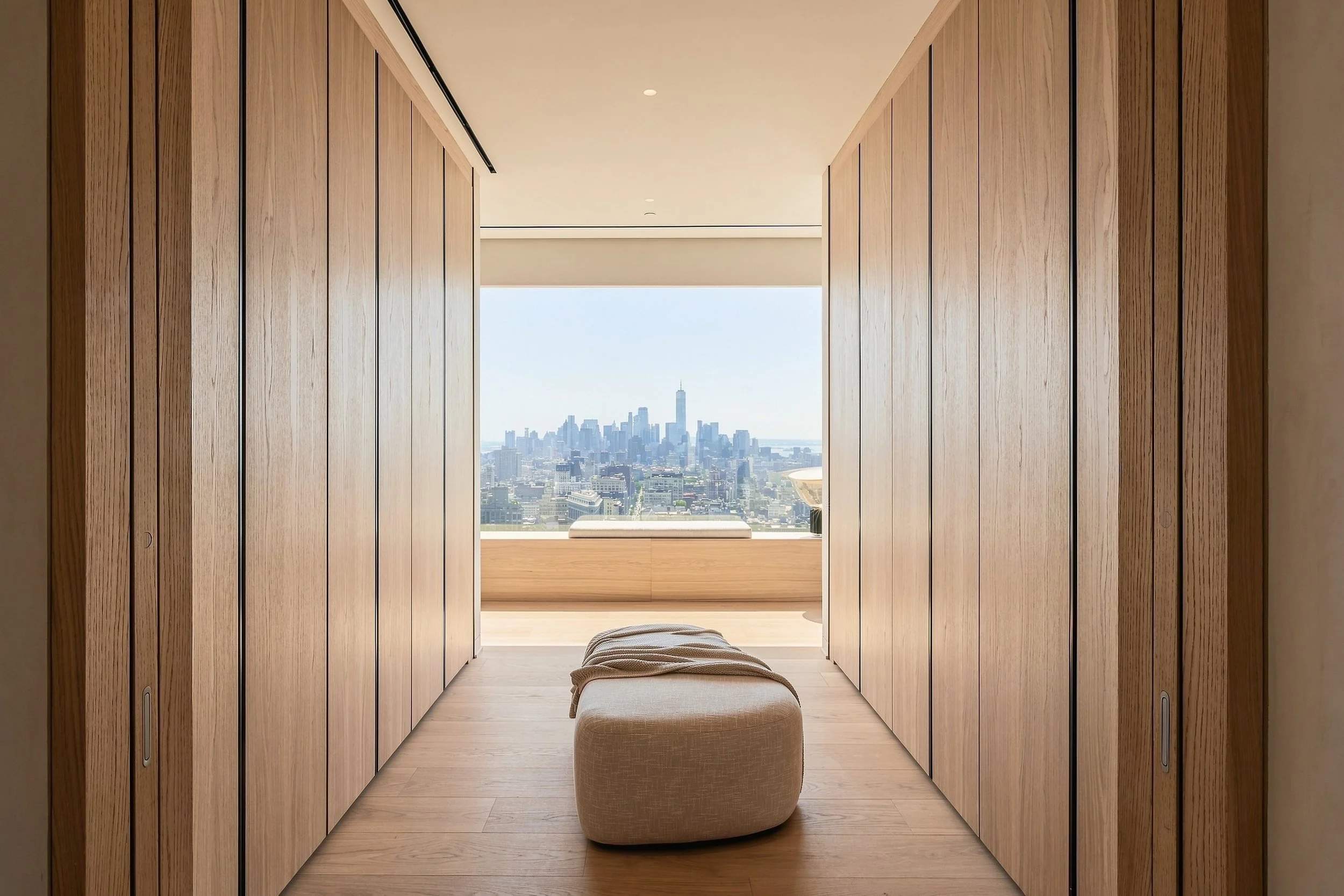 Oak-paneled dressing room with skyline window