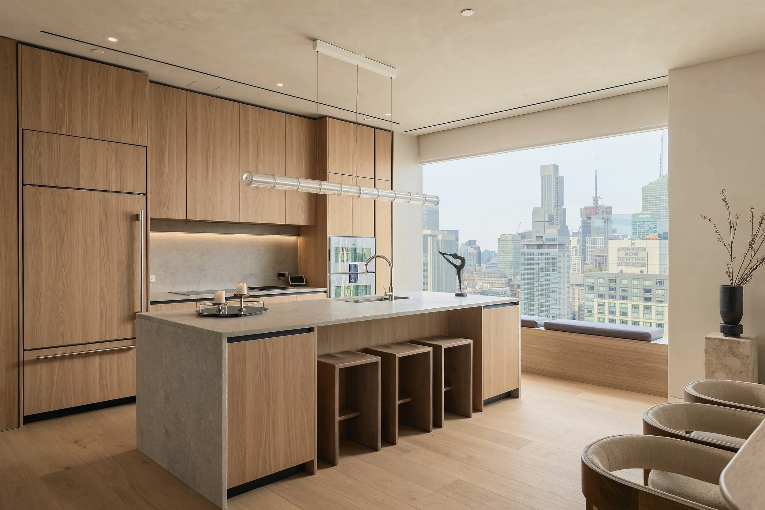 Kitchen island with bar stools and Manhattan skyline view