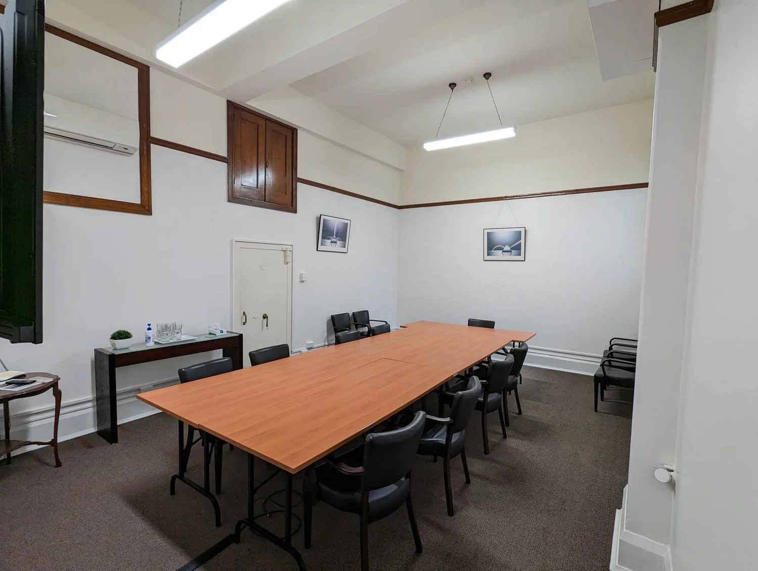 Meeting Room 110 with a large screen