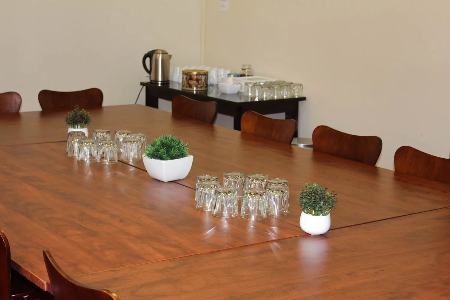 Meeting Room 110 set with glasses and water
