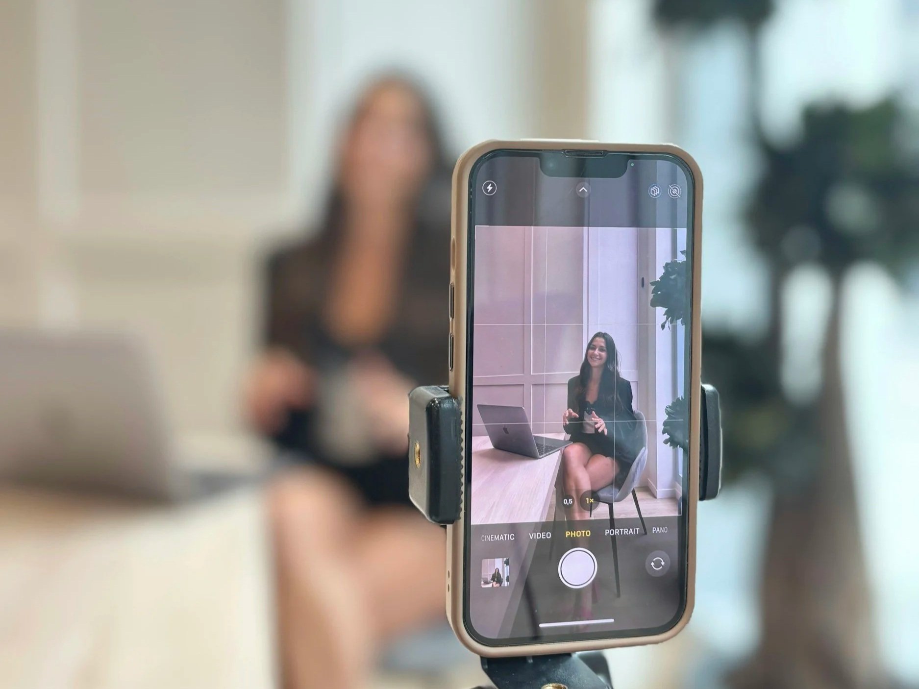 female real estate agent recording social media video content on a phone