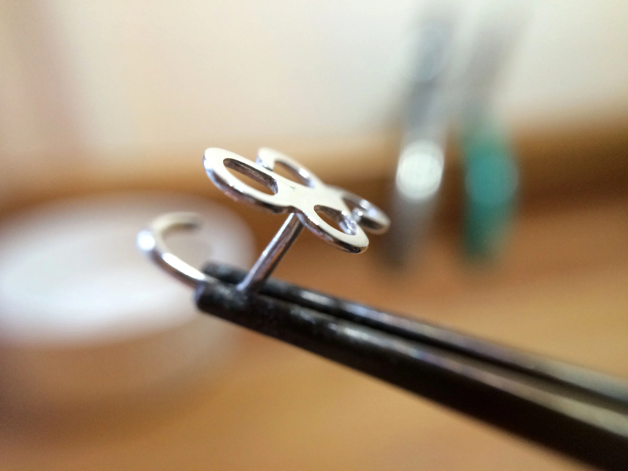 Infinity symbol nose stud