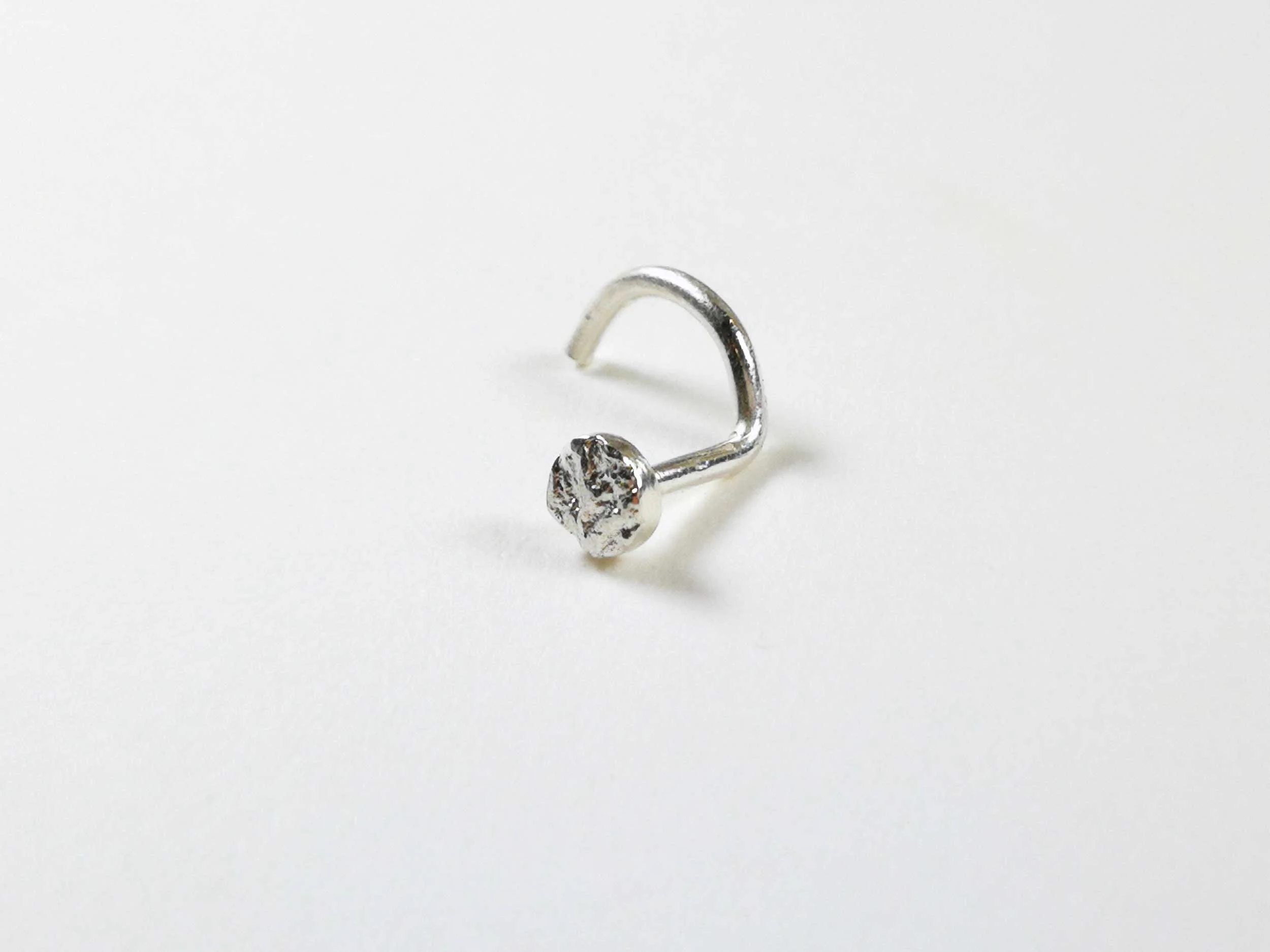 Tiny silver nose stud product photo