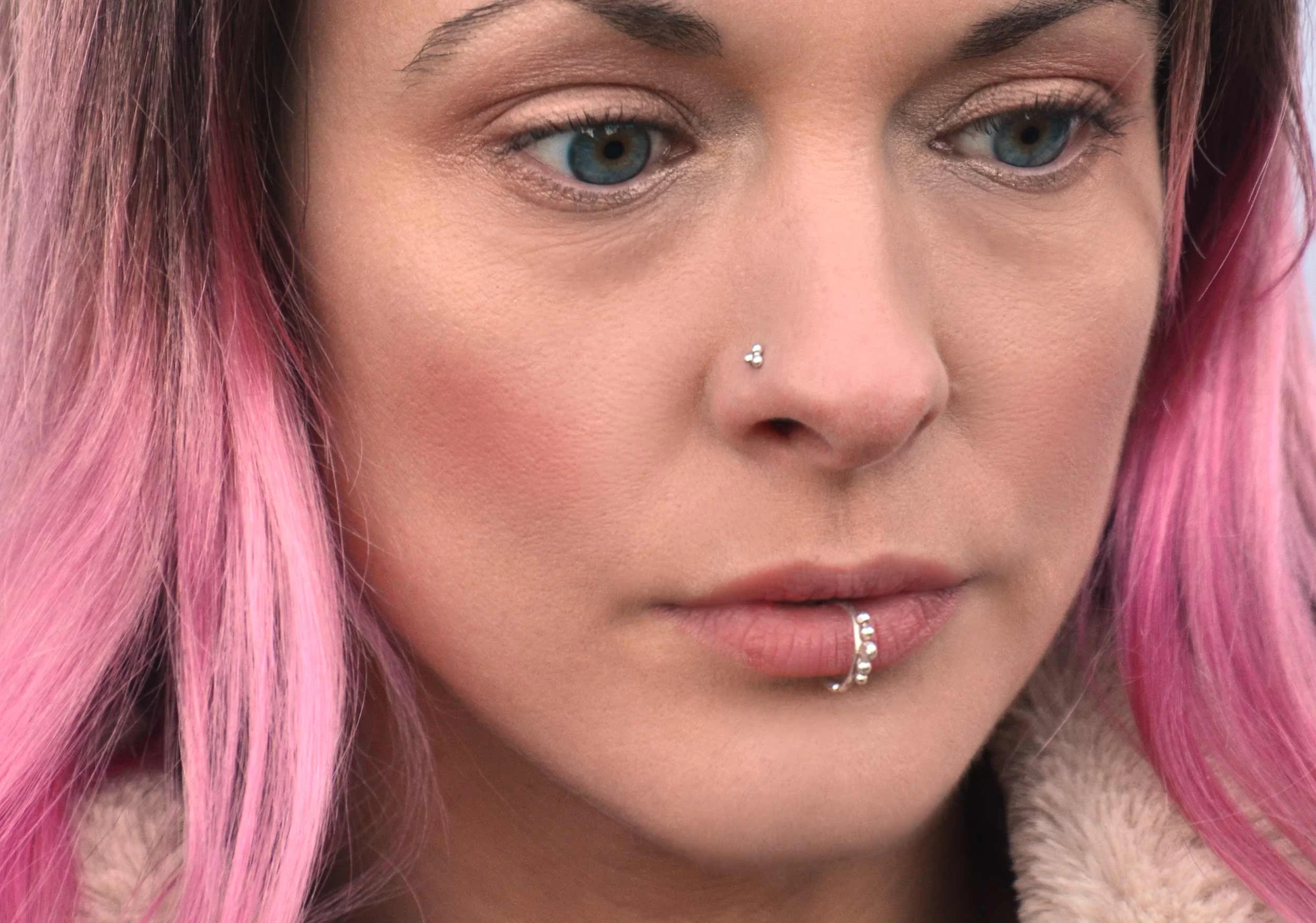 Handmade-delicate-silver-nose-stud-on-model-victoria-grace-silversmith.jpg
