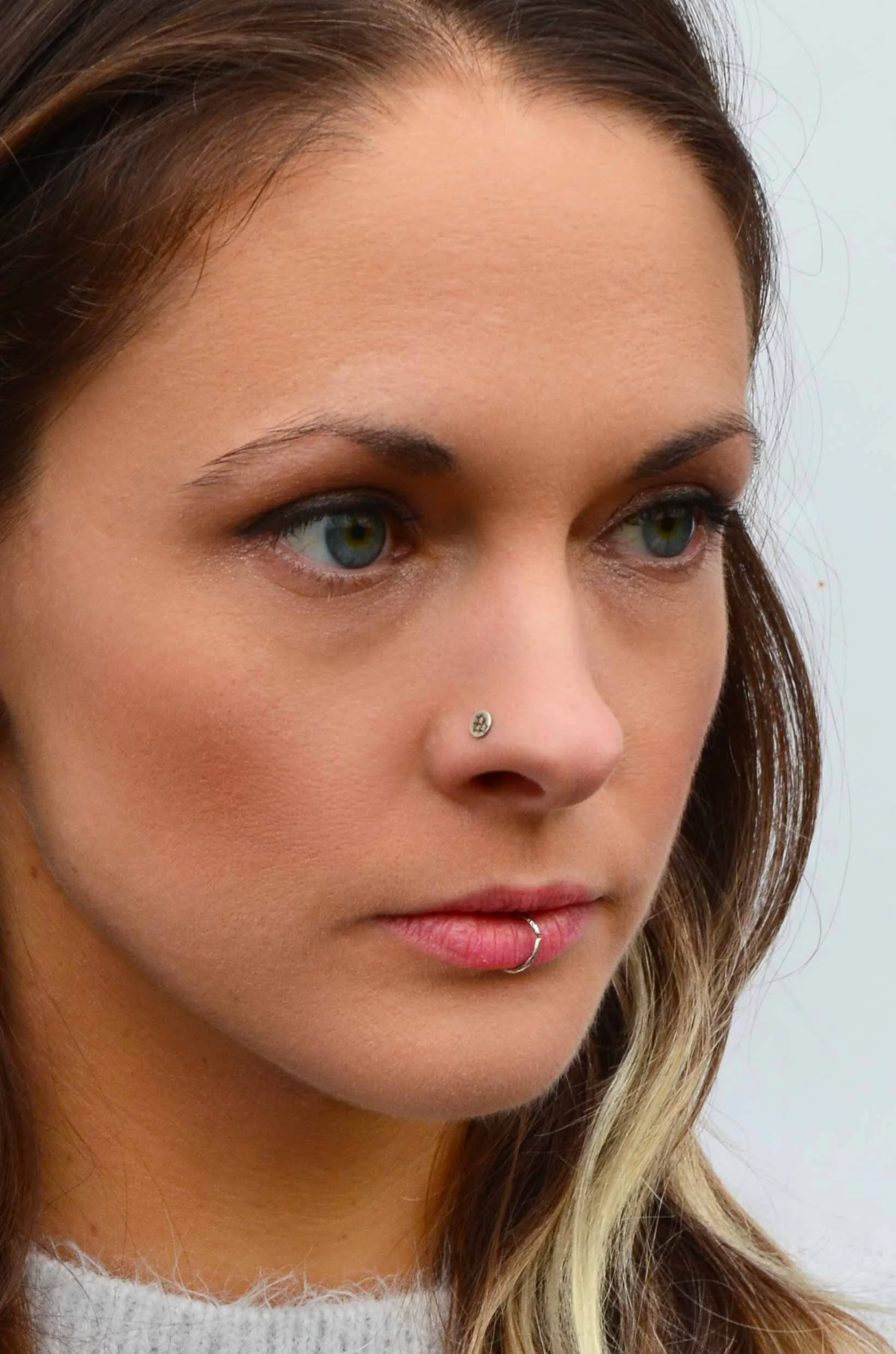 Handmade stars nose stud by victoria grace silversmith on model