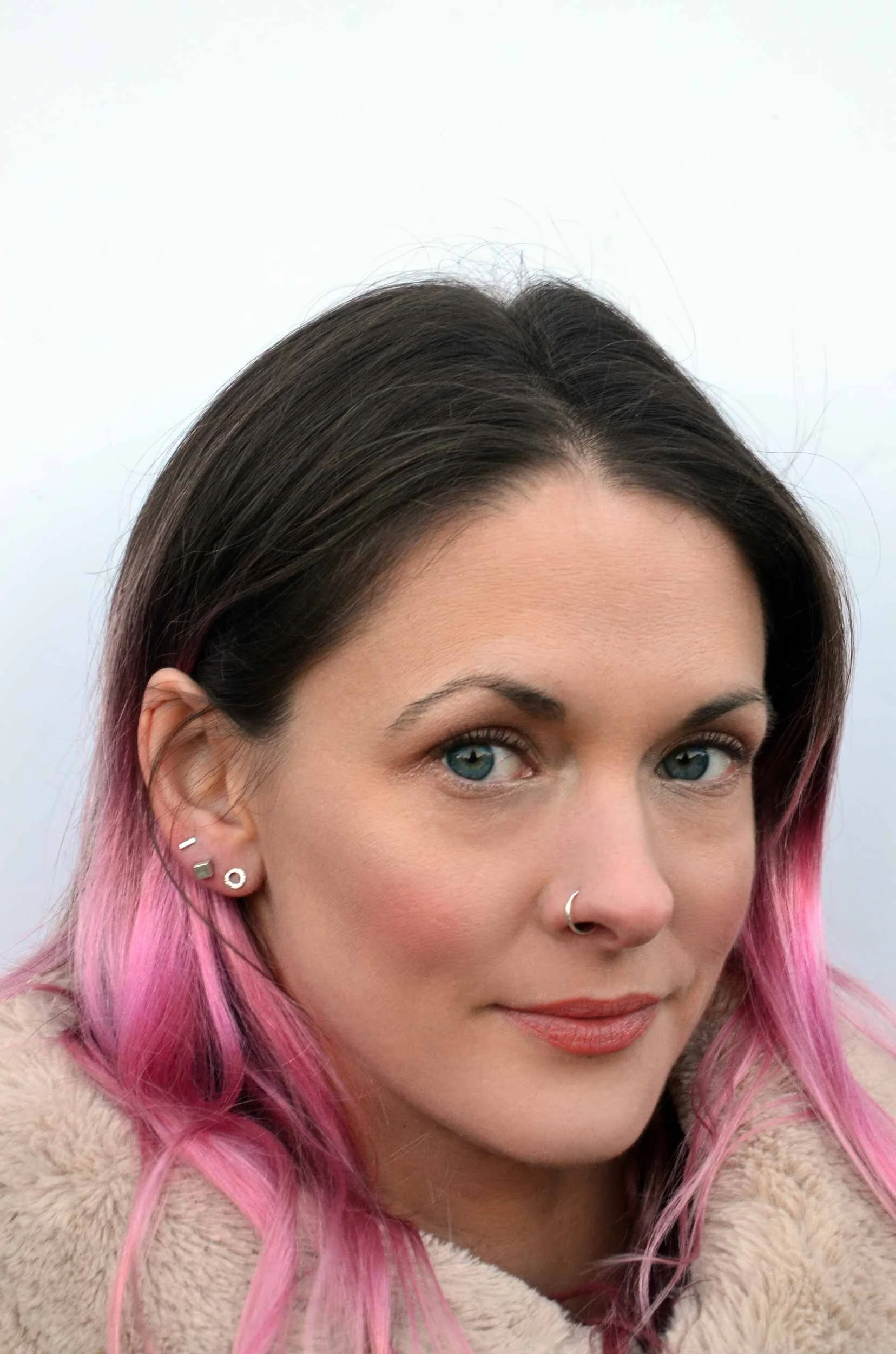 Silver-hoop-nose-ring-on-model.jpg