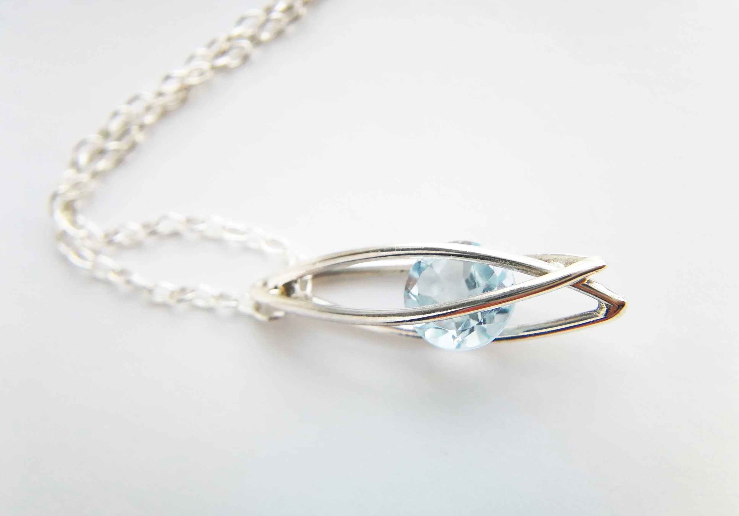 one of a kind blue topaz and recycled silver cage necklace victoria grace silversmith