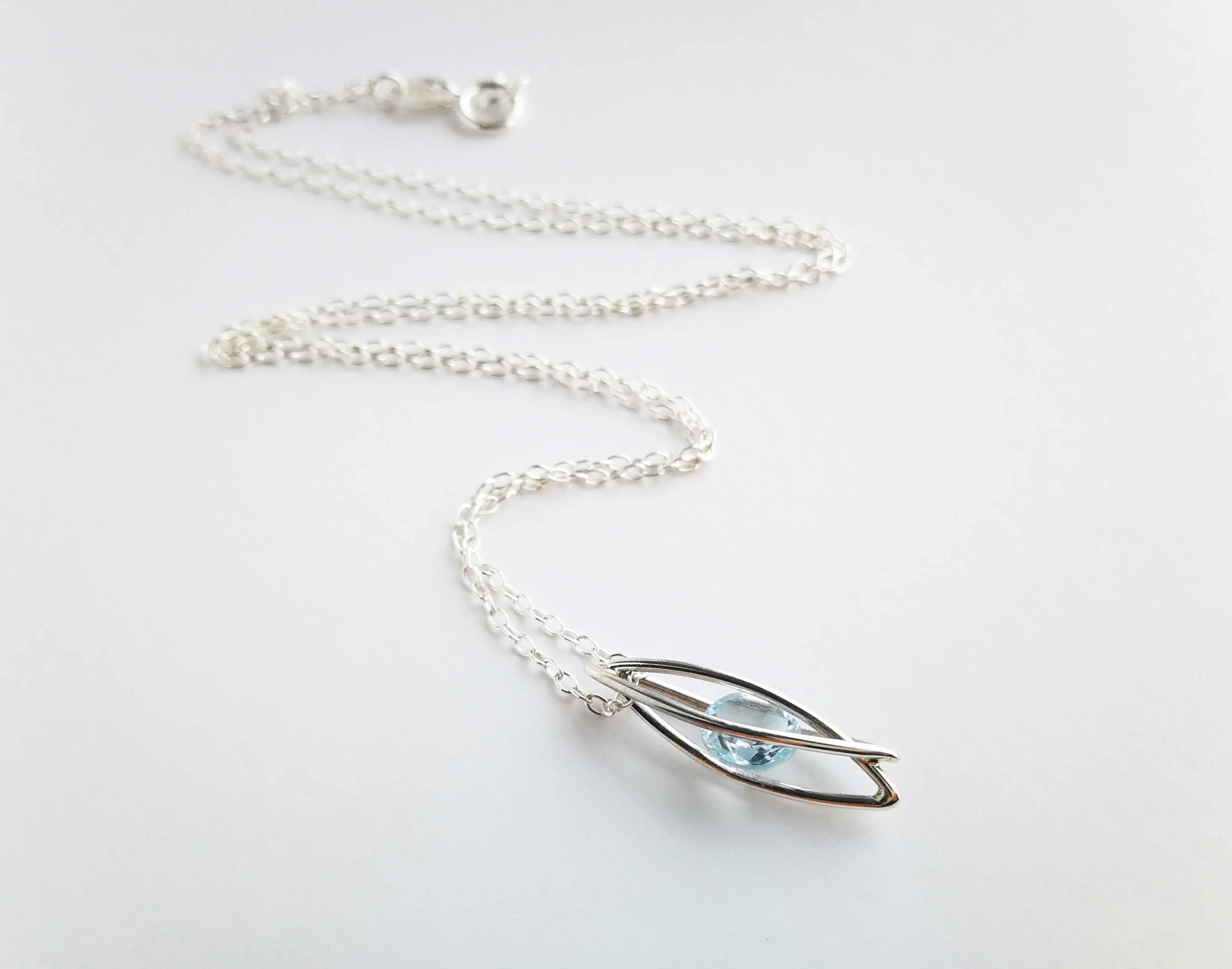handmade sterling silver and topaz necklace victoria grace silversmith product photo