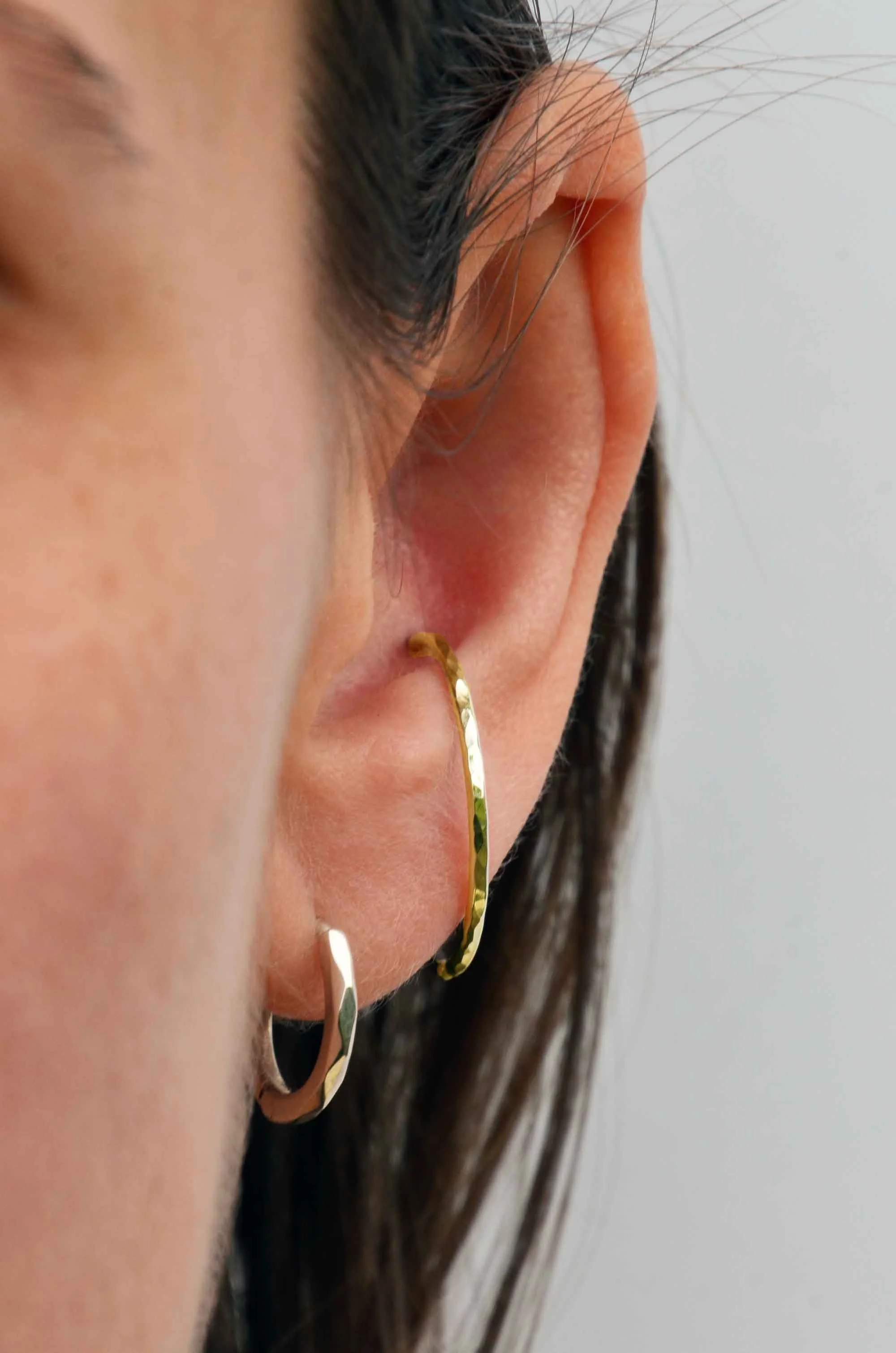 handmade oversize 9ct conch hoop on model