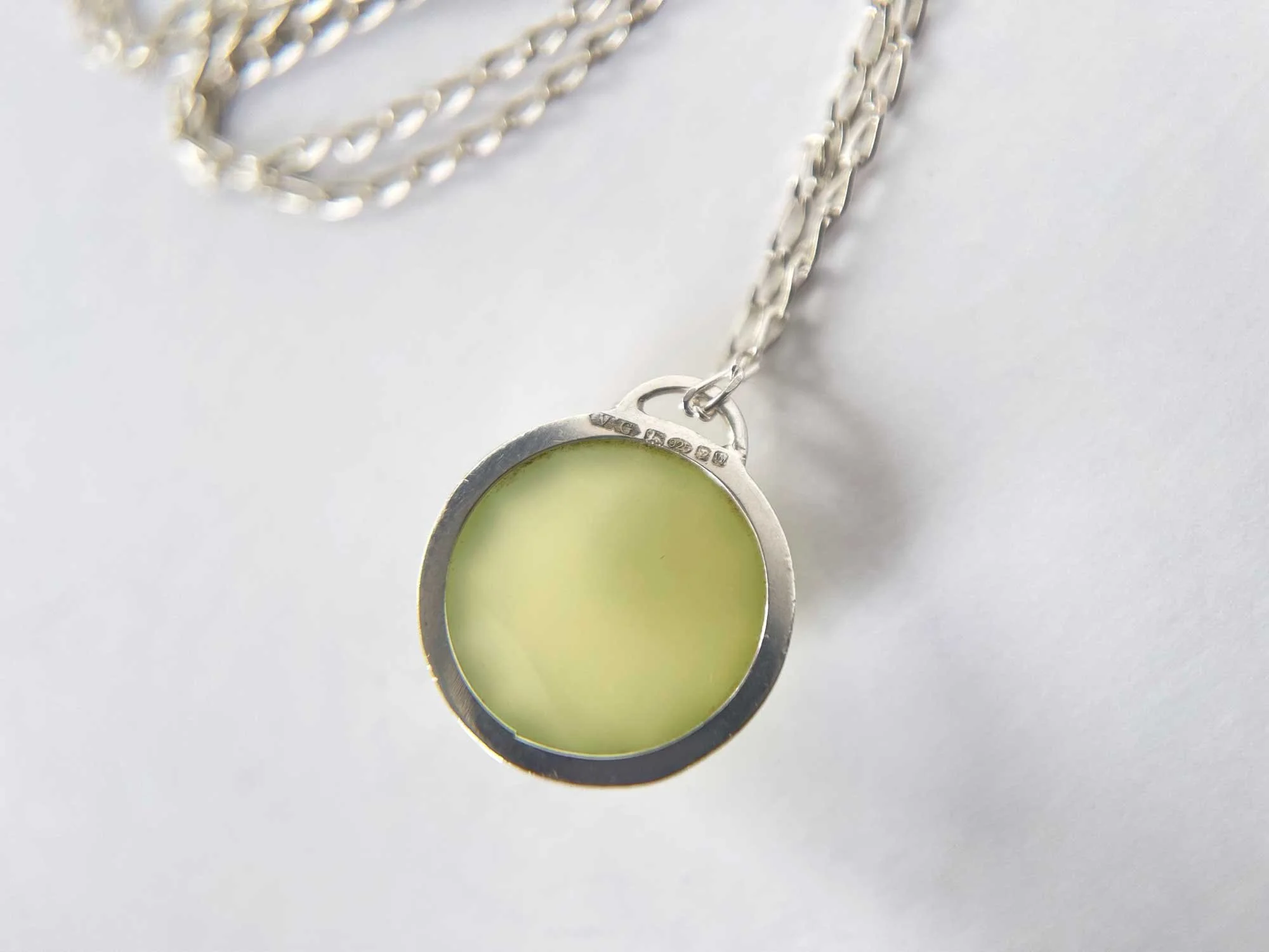 back green chalcedony pendant with hallmarking close up