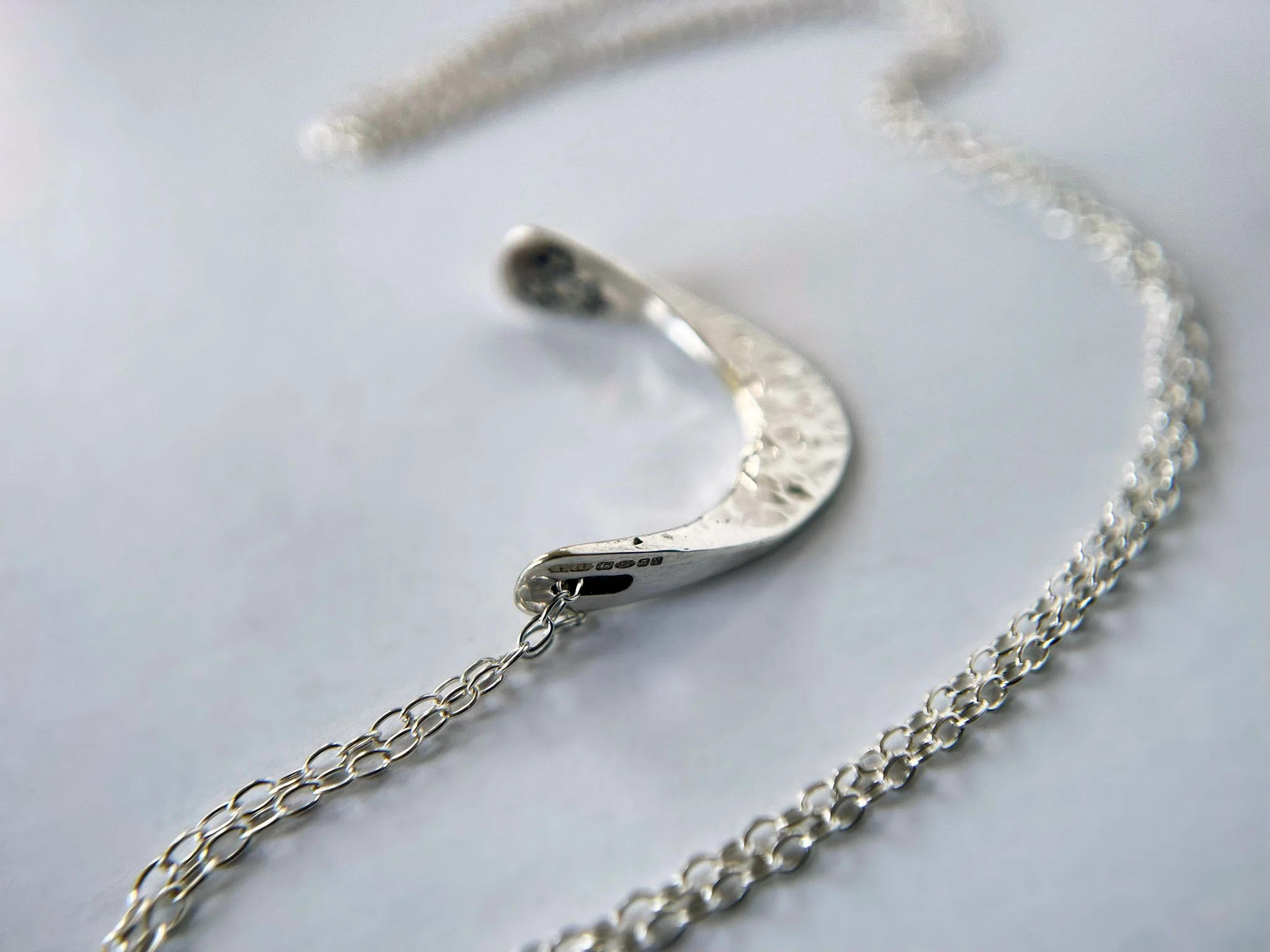hallmarked silver moon pendant close up